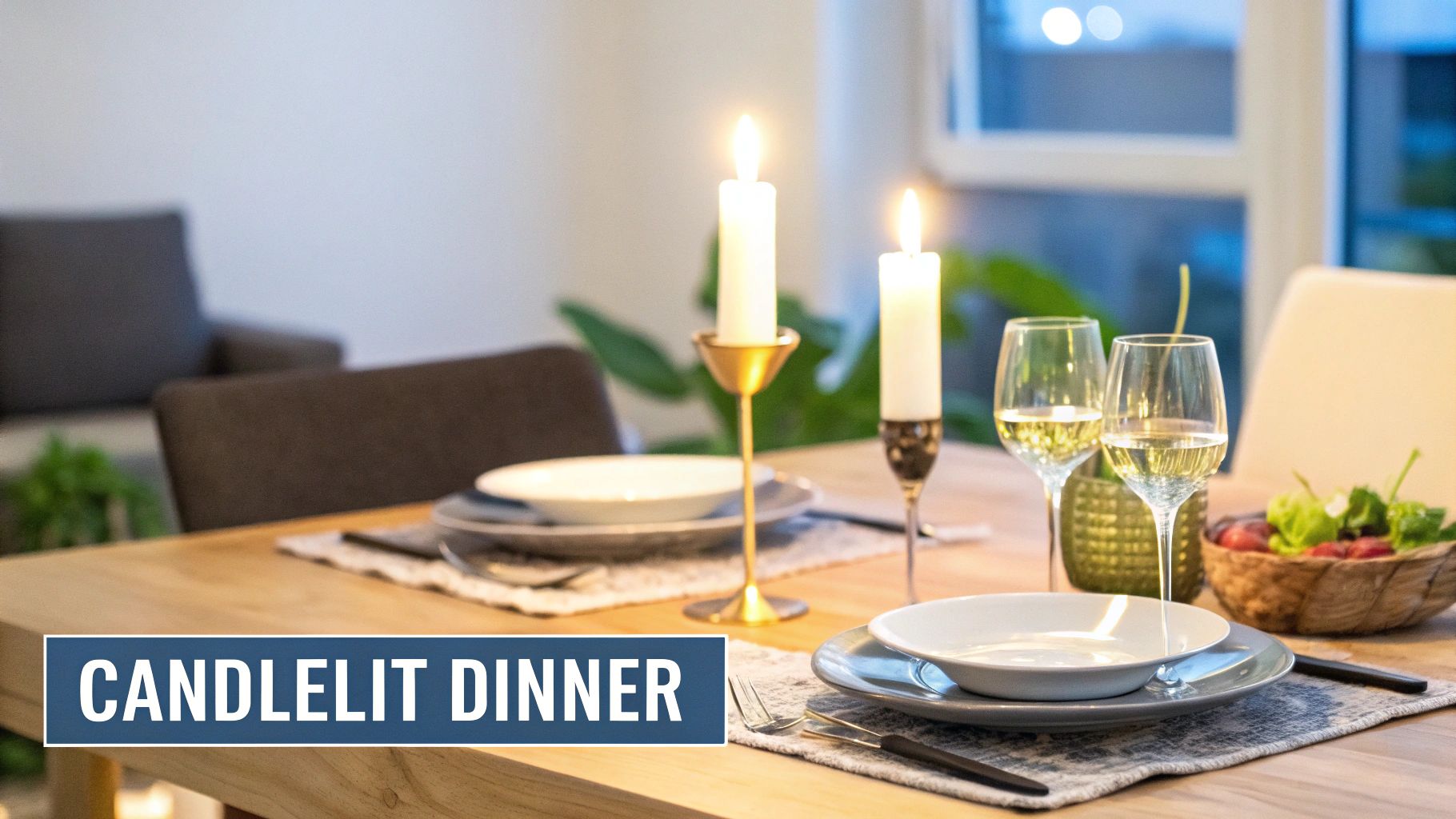 A romantic candlelit dinner setup on a wooden table with wine glasses, plates, and fresh salad.