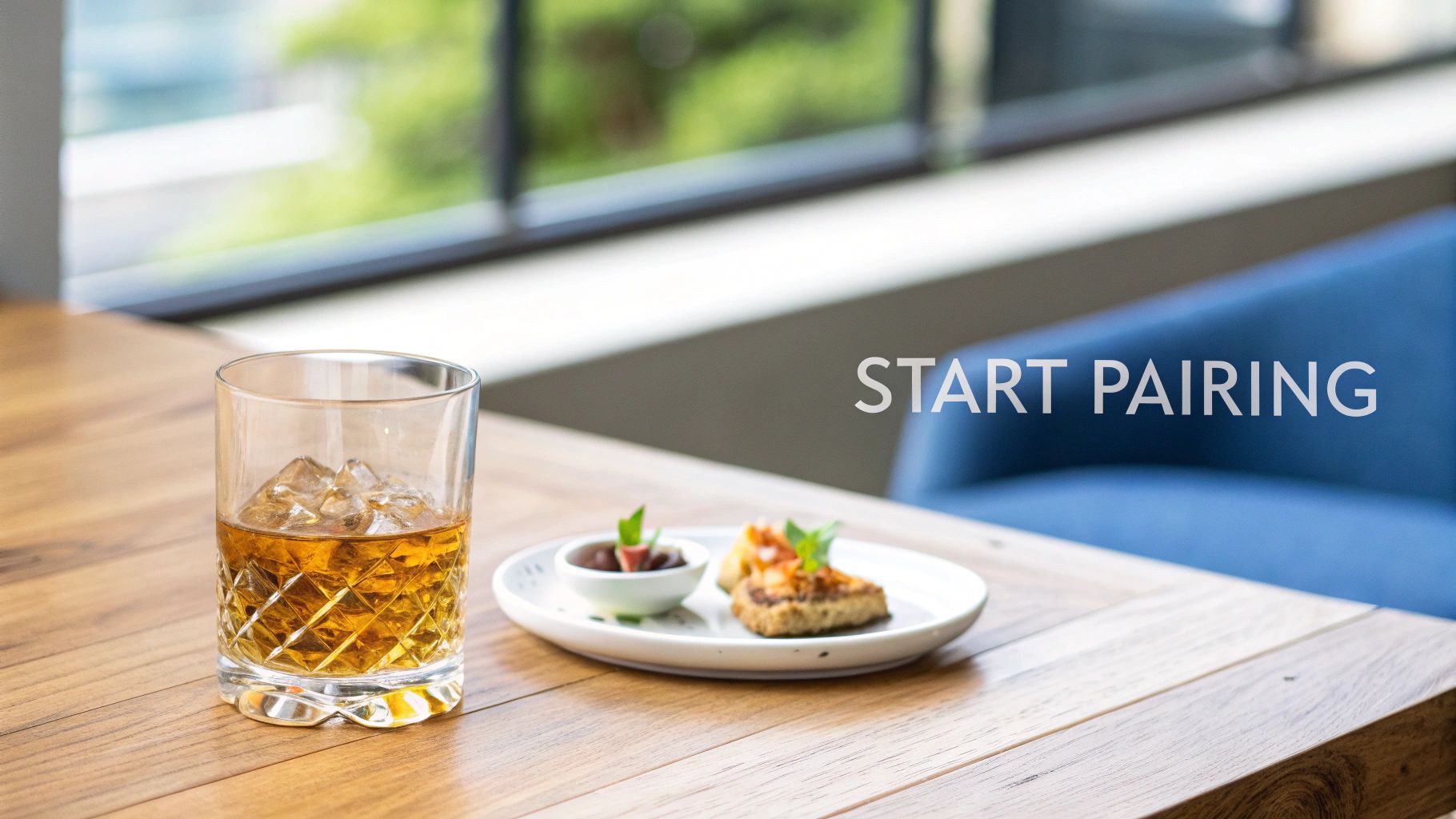 A person pouring a glass of whisky next to a prepared meal, highlighting the pairing experience.