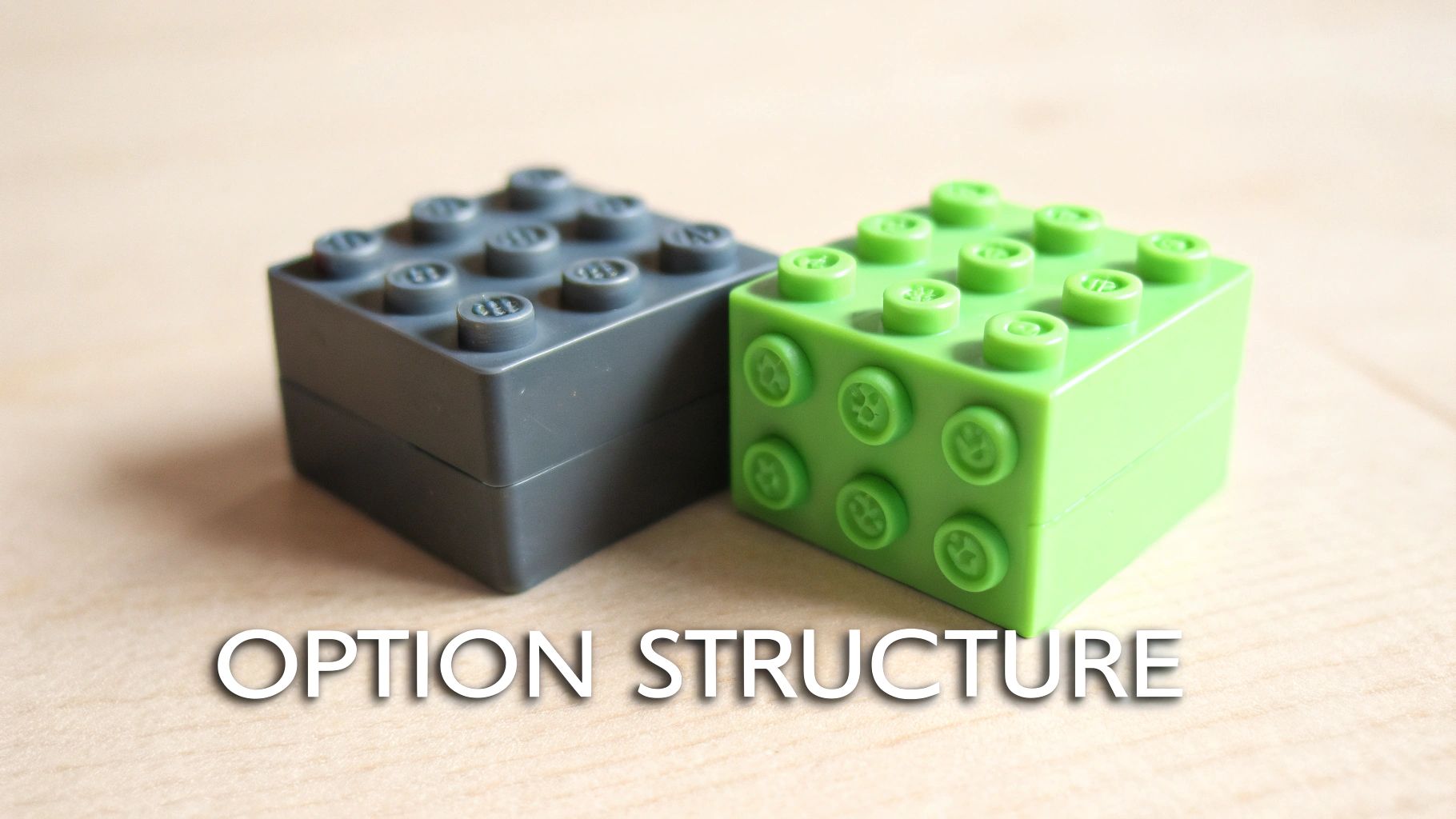 Two LEGO blocks, one green and one red, clicking together perfectly.