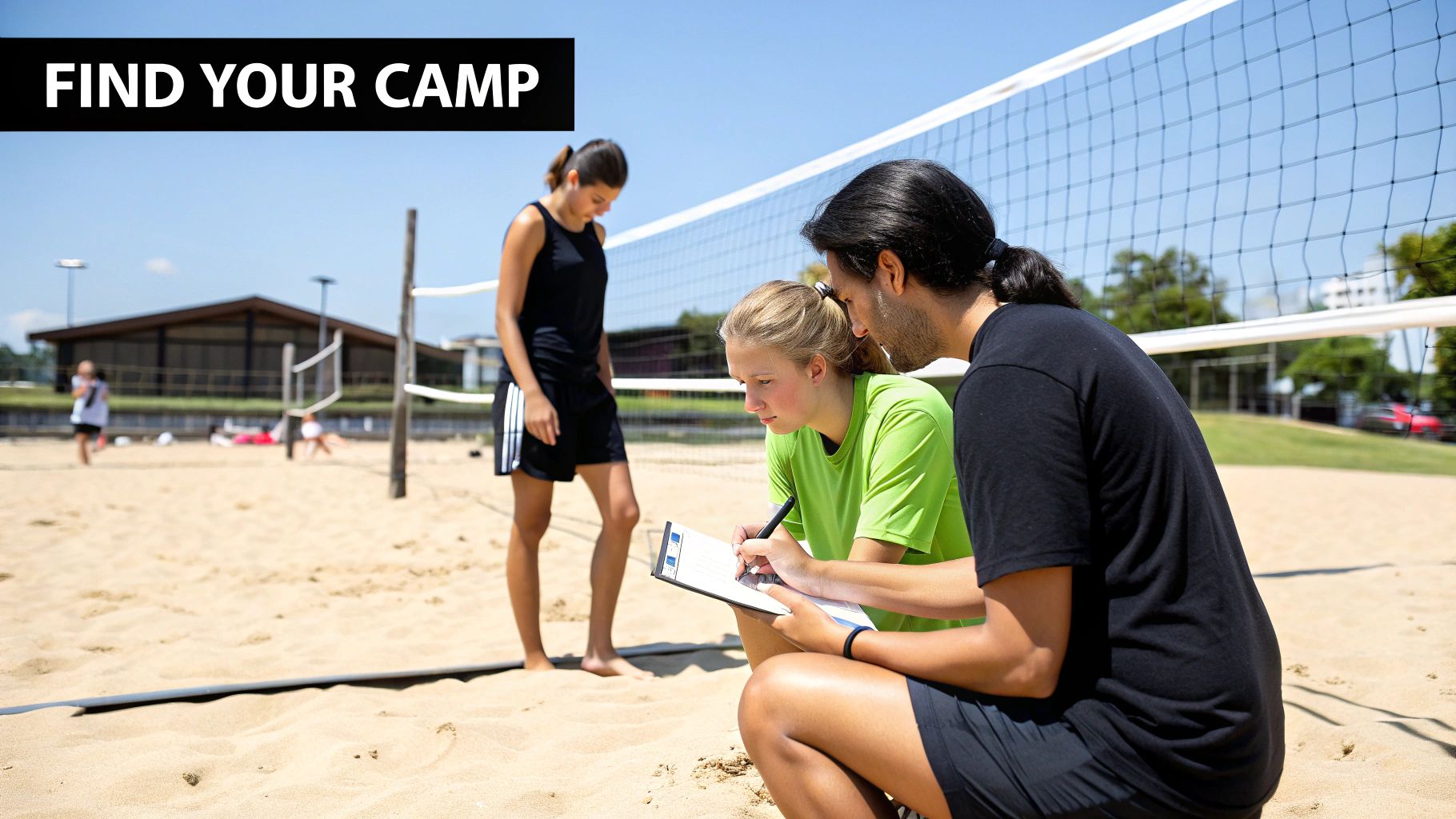 Two people on a beach volleyball court, one writing on a clipboard while another observes nearby.
