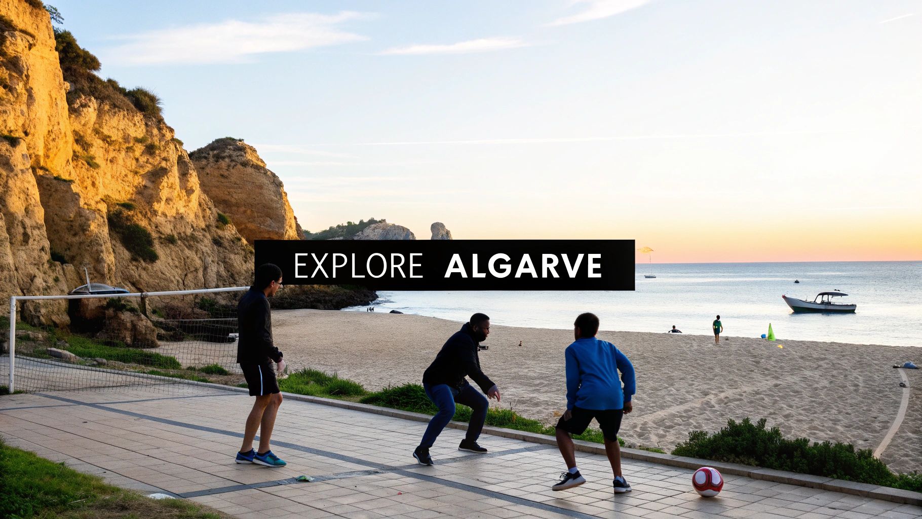 People playing soccer on a paved area next to a sandy beach and ocean with cliffs at sunset, 'Explore Algarve' banner.