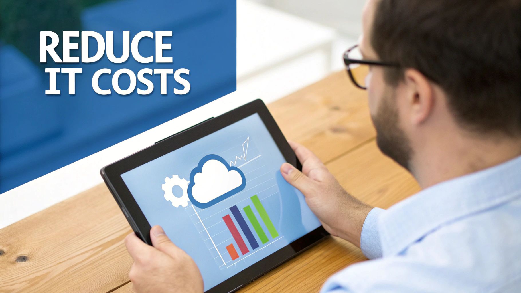 Man reviewing cloud computing data and analytics on a tablet, next to a 'Reduce IT Costs' banner.