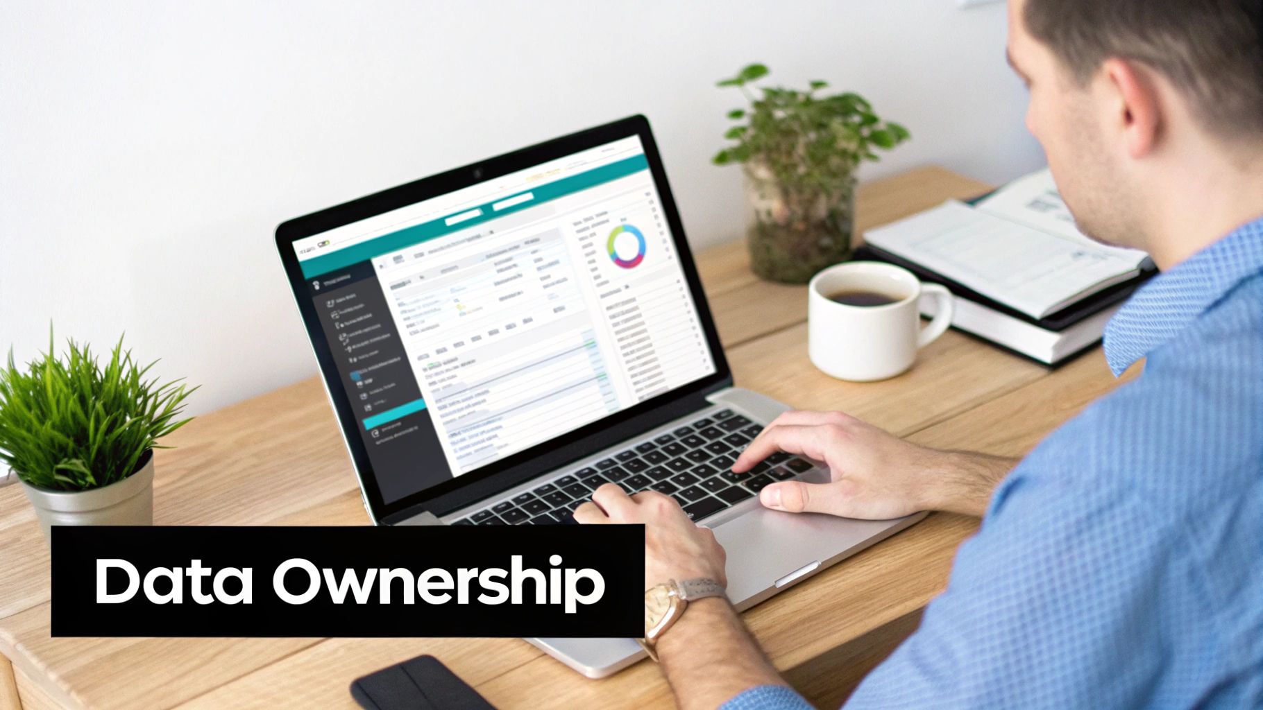 Man working on laptop with data analytics dashboard, coffee, and plants on a modern wooden desk.