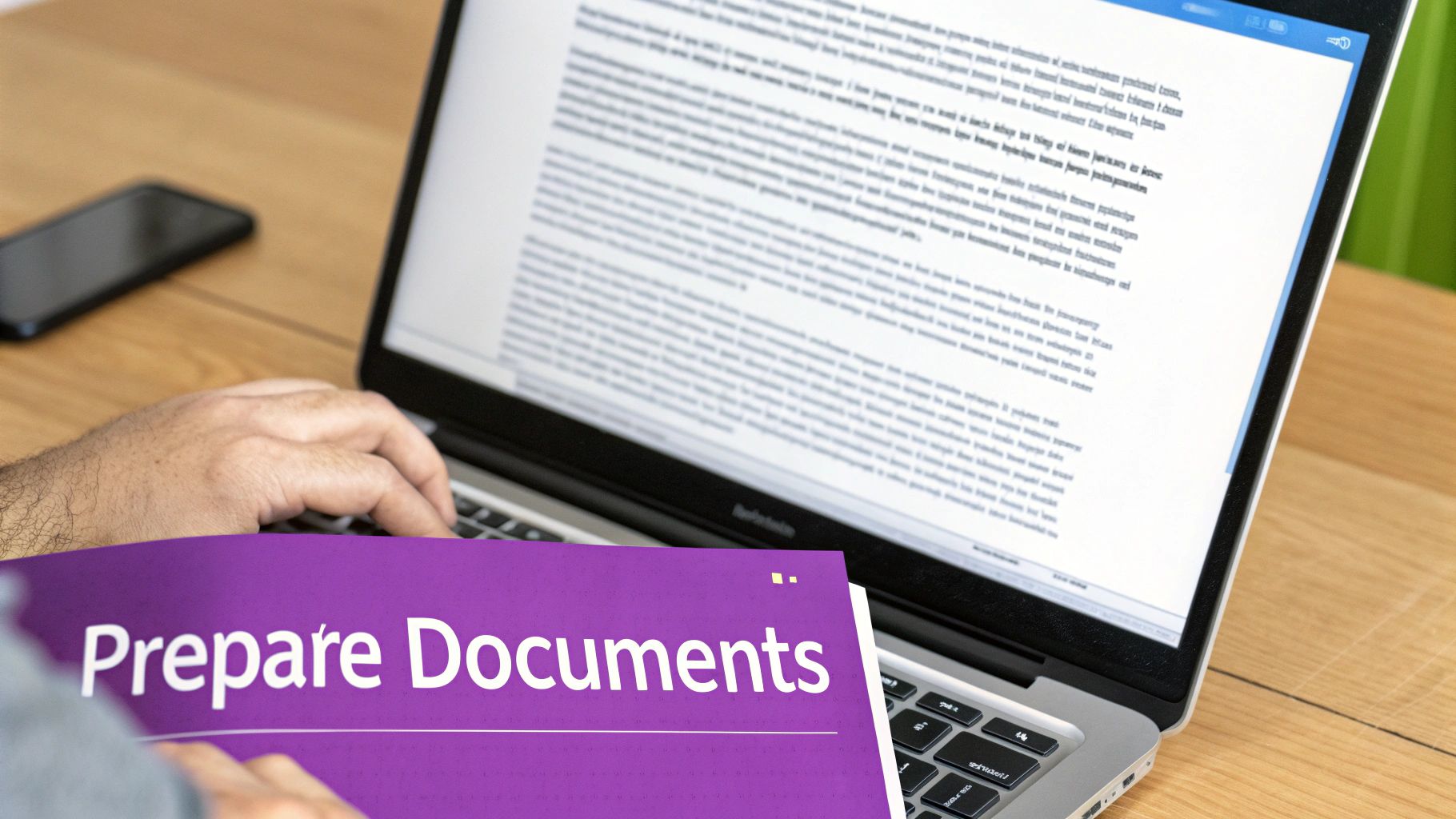 Hands typing on a laptop keyboard with a document on screen and a 'Prepare Documents' folder.