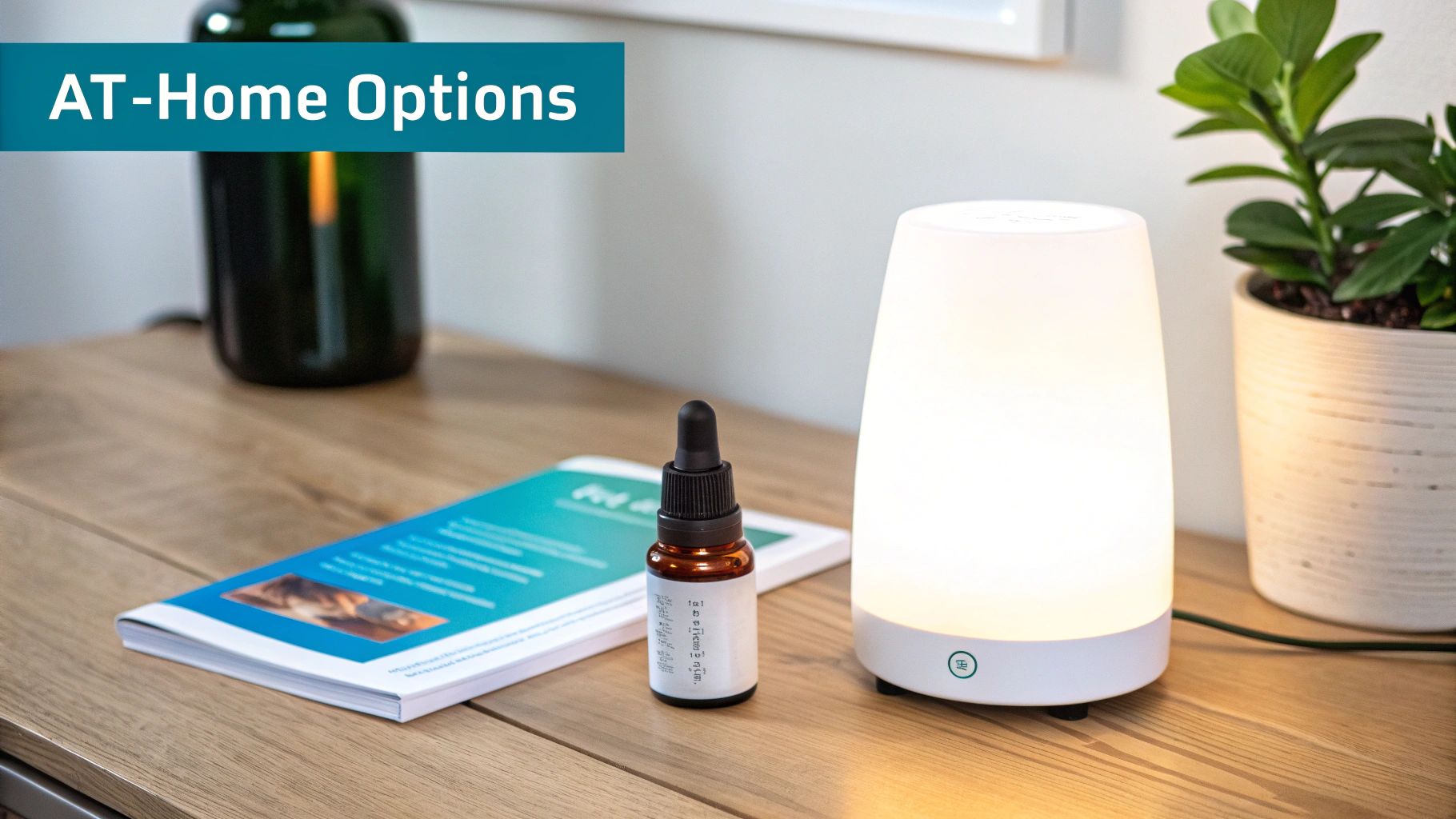 A wooden surface displays an essential oil diffuser, oil bottle, and brochure for at-home wellness options.