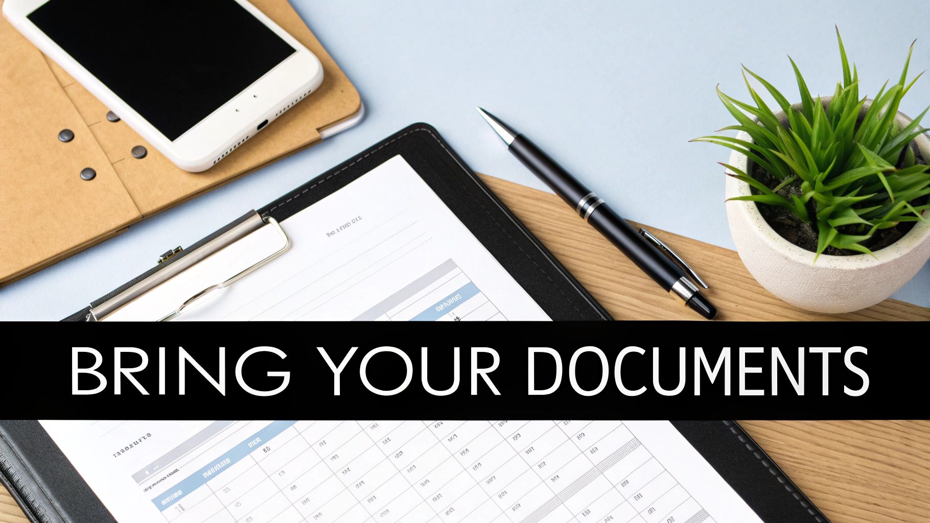 A flat lay of an office desk with a phone, pen, documents on a clipboard, and a plant. Text: BRING YOUR DOCUMENTS.