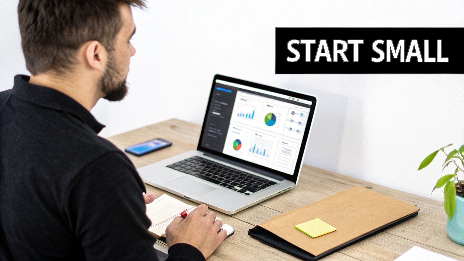 Man works at a desk, analyzing data on a laptop while taking notes. 'START SMALL' text.