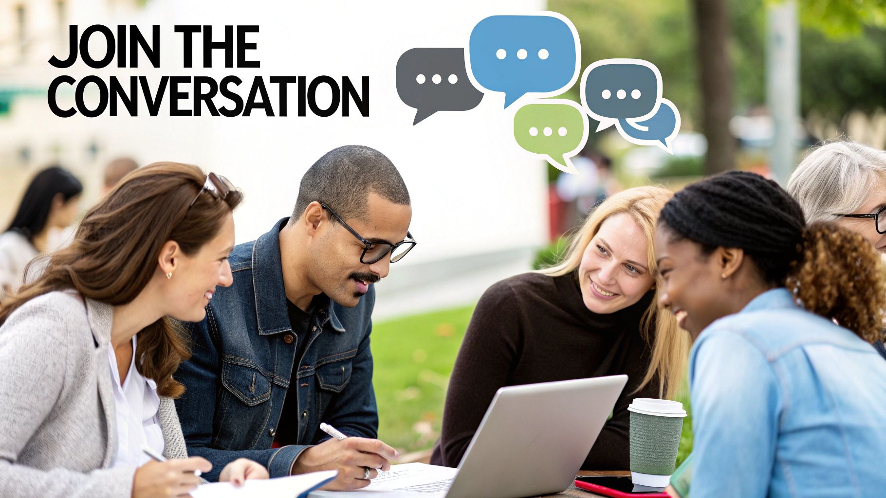 A diverse group of professionals engaging in a lively discussion around a table, symbolizing a thriving community.