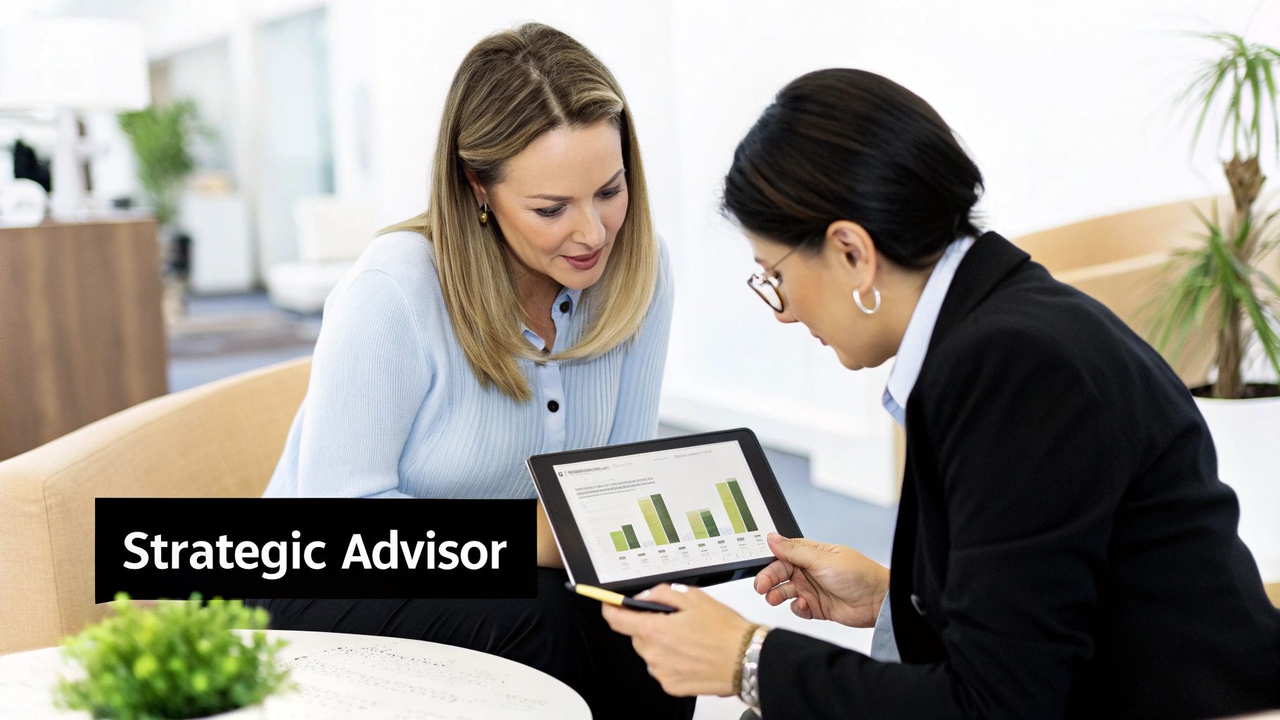A person at a desk using a calculator and laptop, symbolising strategic financial planning.