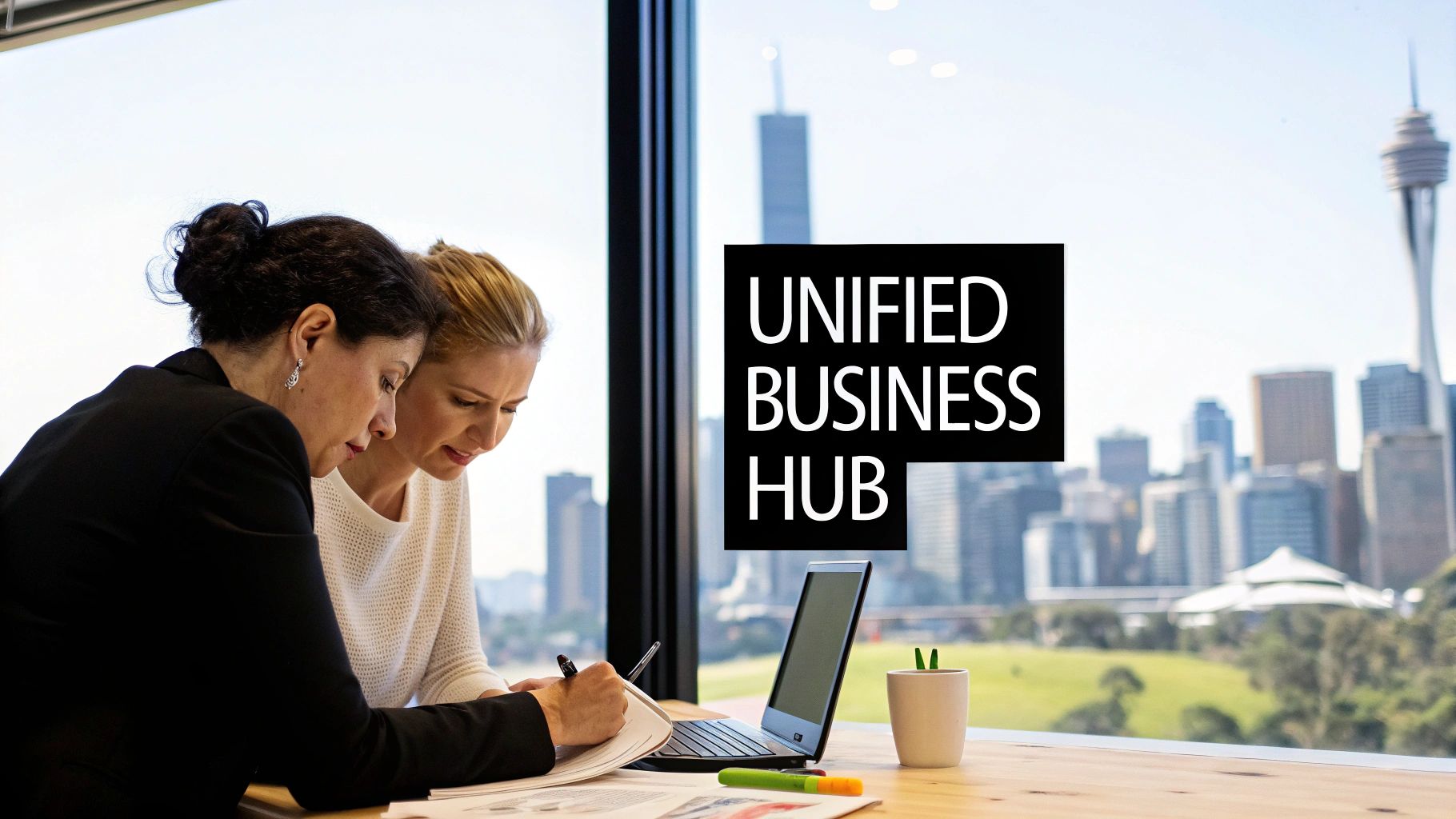 A team of business professionals collaborating around a computer screen in a modern office, representing the use of Odoo software.