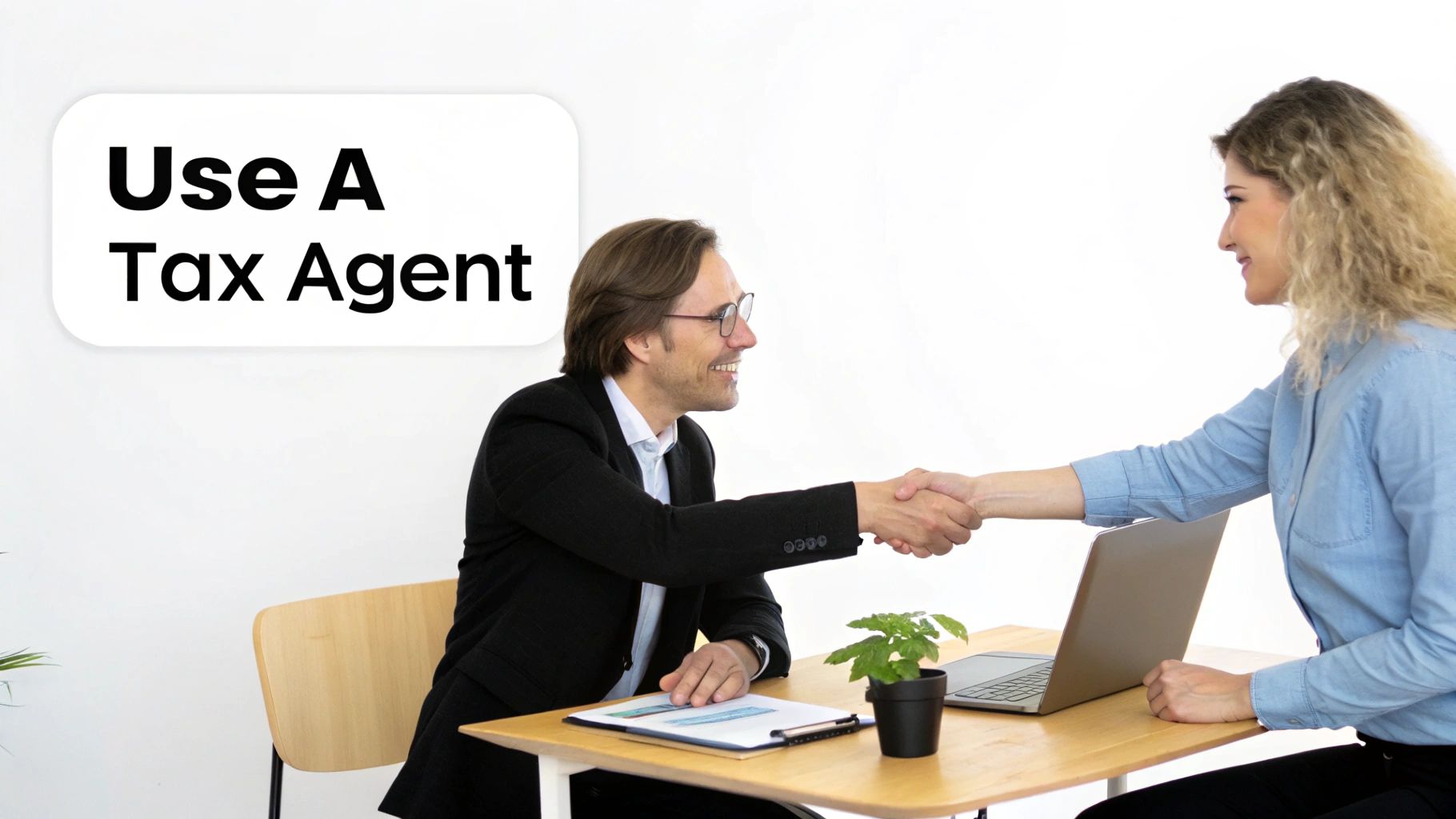 A professional tax agent discussing documents with a client in a modern office.