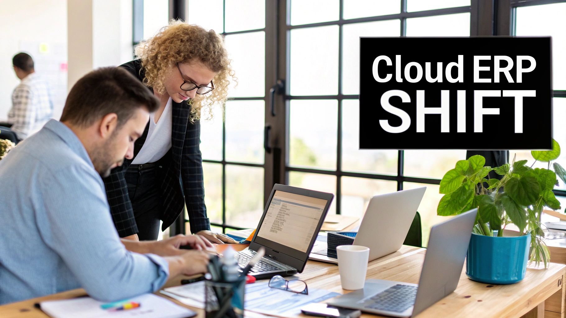 A team of professionals collaborating in a modern office, representing the agility of cloud ERP systems.