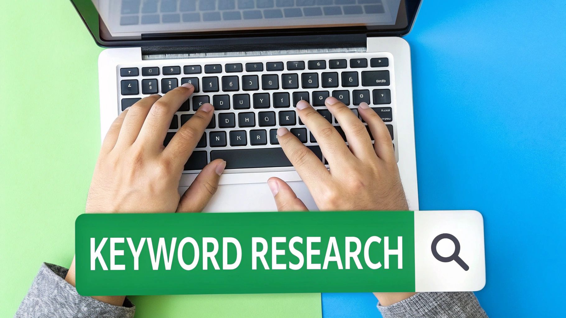 An image showing a person conducting keyword research on a laptop, with search bars and keyword lists visible on the screen.