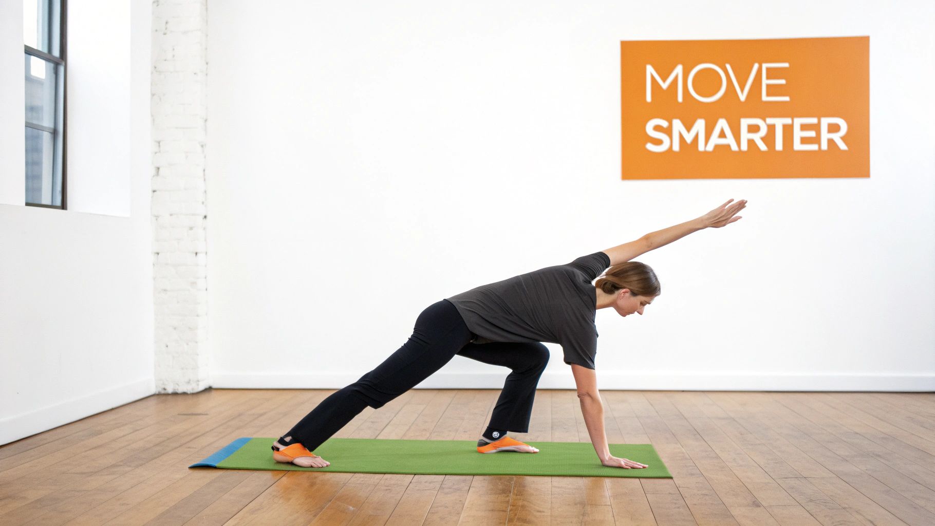 Woman performing a squat with a barbell in a gym setting.