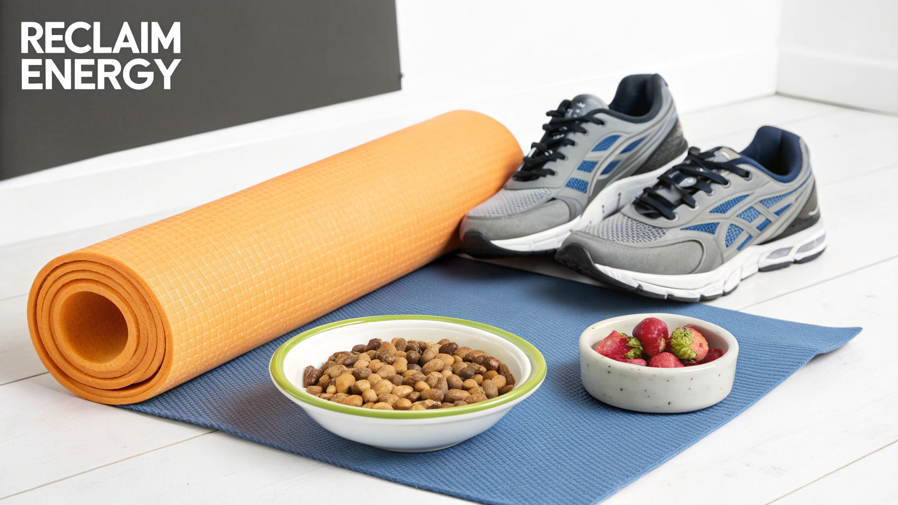Fitness essentials including yoga mat, running shoes, healthy snacks and strawberries for energy and wellness