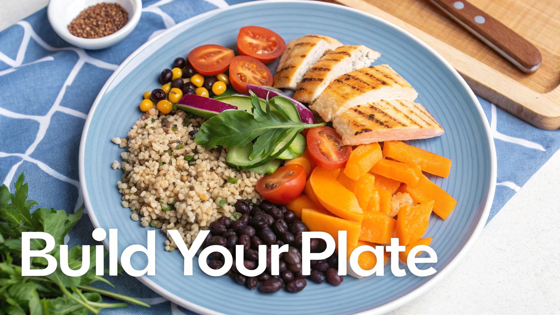 A colorful plate filled with lean protein, vegetables, and complex carbohydrates, representing a balanced meal for fat loss.