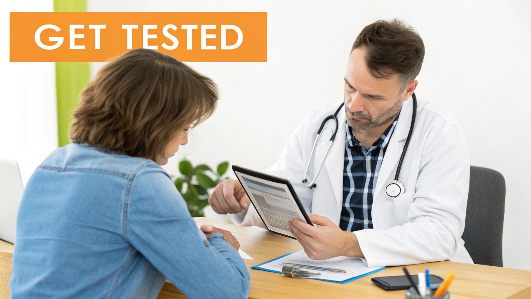 A doctor discusses results on a tablet with a patient during a medical consultation, with 'GET TESTED' text.
