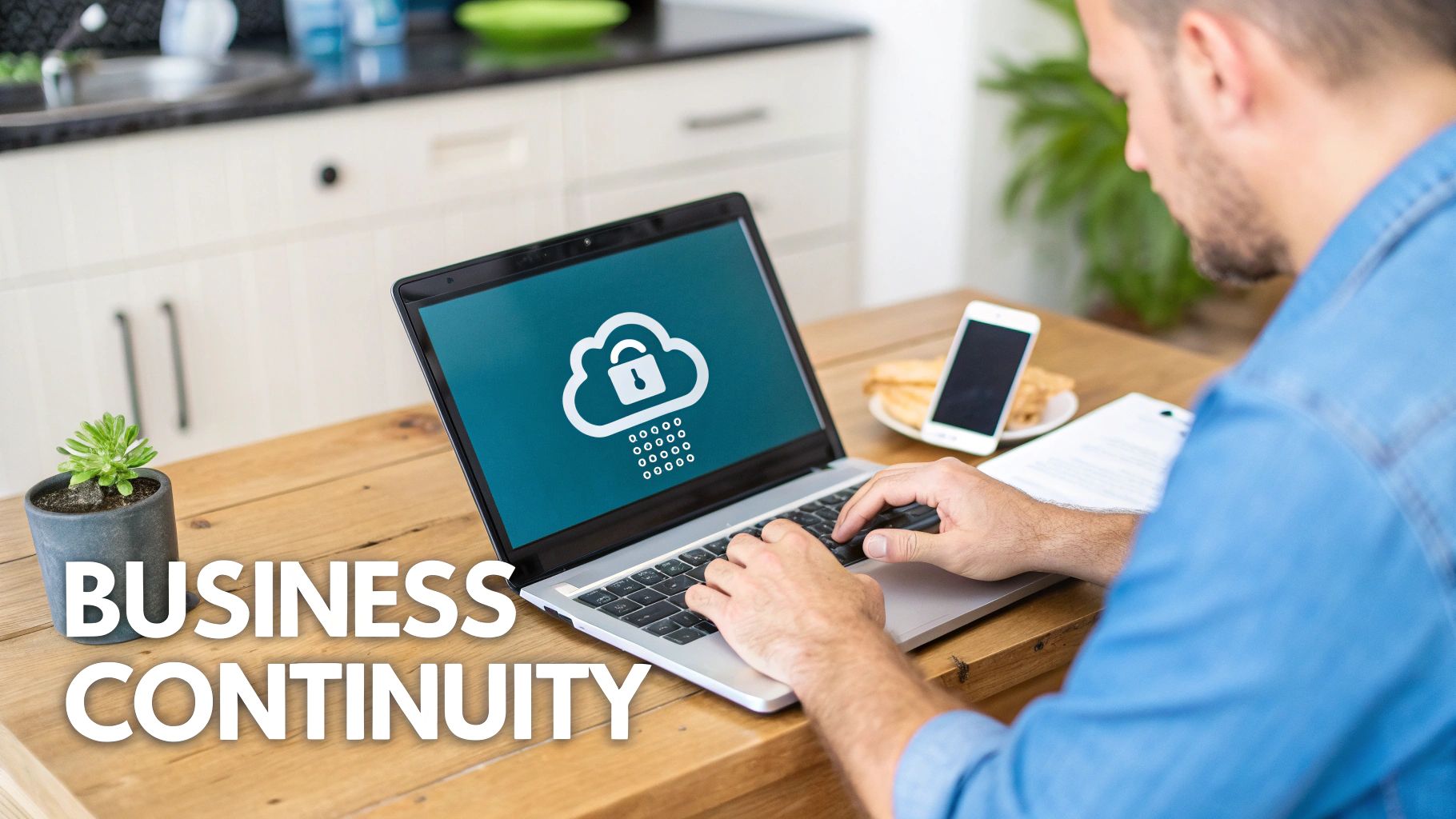 A person working on a laptop in a modern, light-filled office, representing operational flexibility.