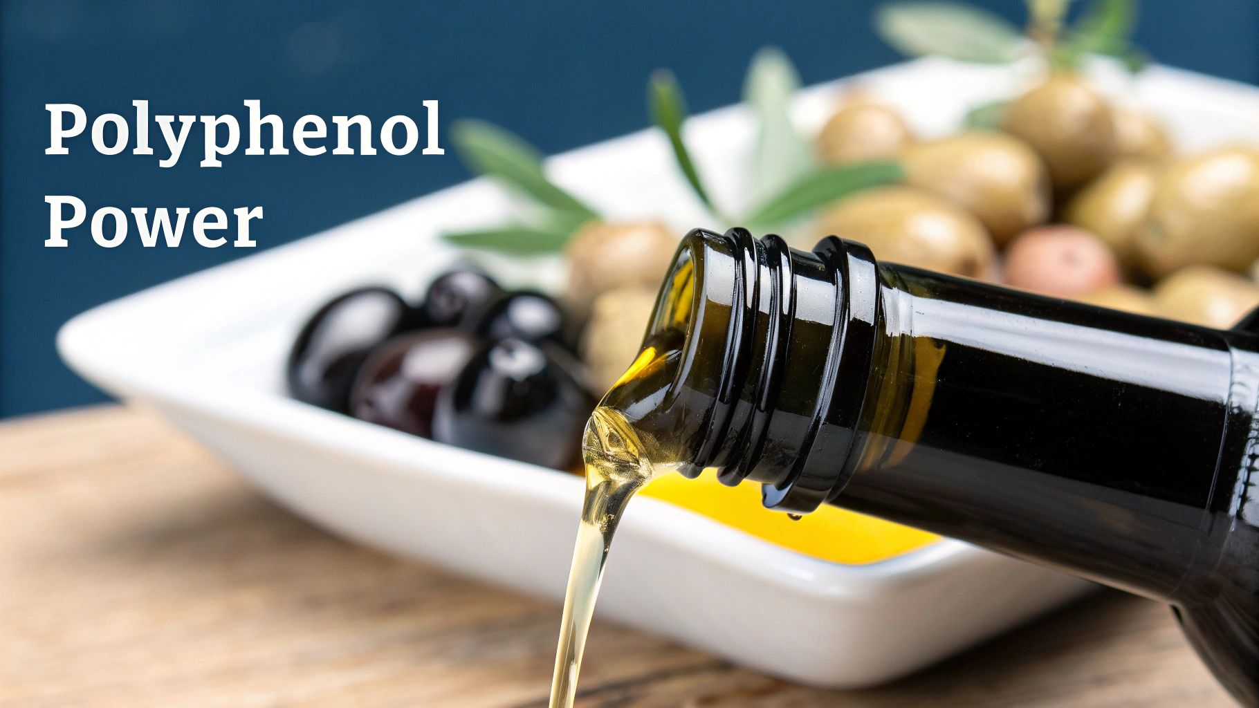 Extra virgin olive oil pouring from a dark bottle into a white dish with green and black olives.