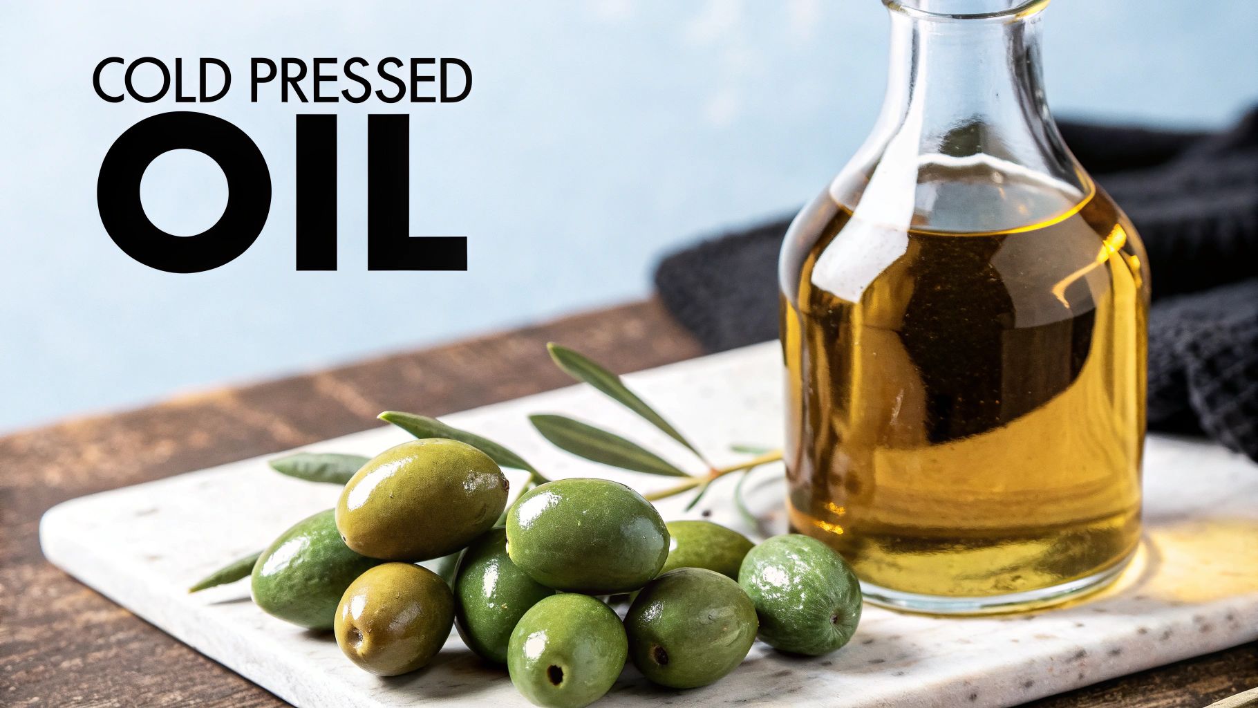 Close-up of golden olive oil being poured into a small bowl