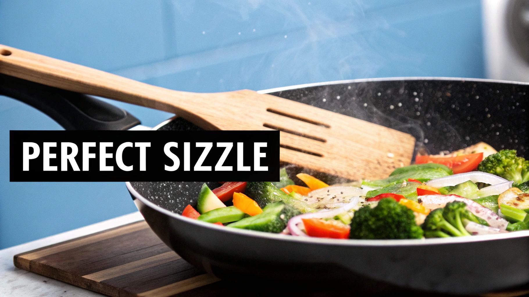 Colorful fresh vegetables sizzling and steaming in a black stir-fry pan with a wooden spatula.