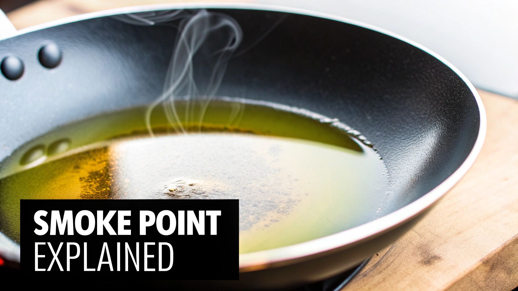 A bottle of olive oil next to a pan on a stove, with a wooden spoon stirring vegetables.