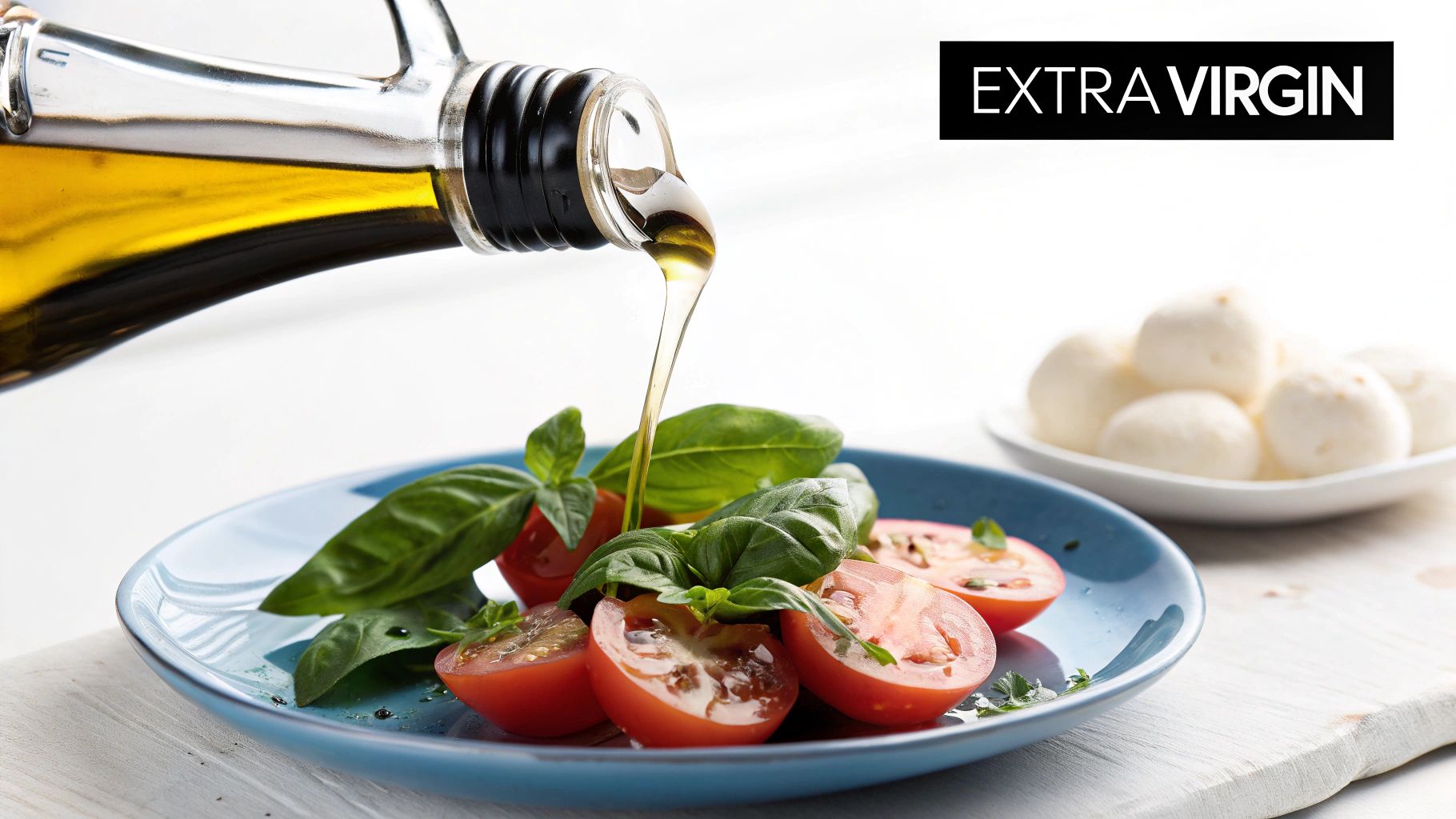 A bottle of refined olive oil next to a measuring spoon