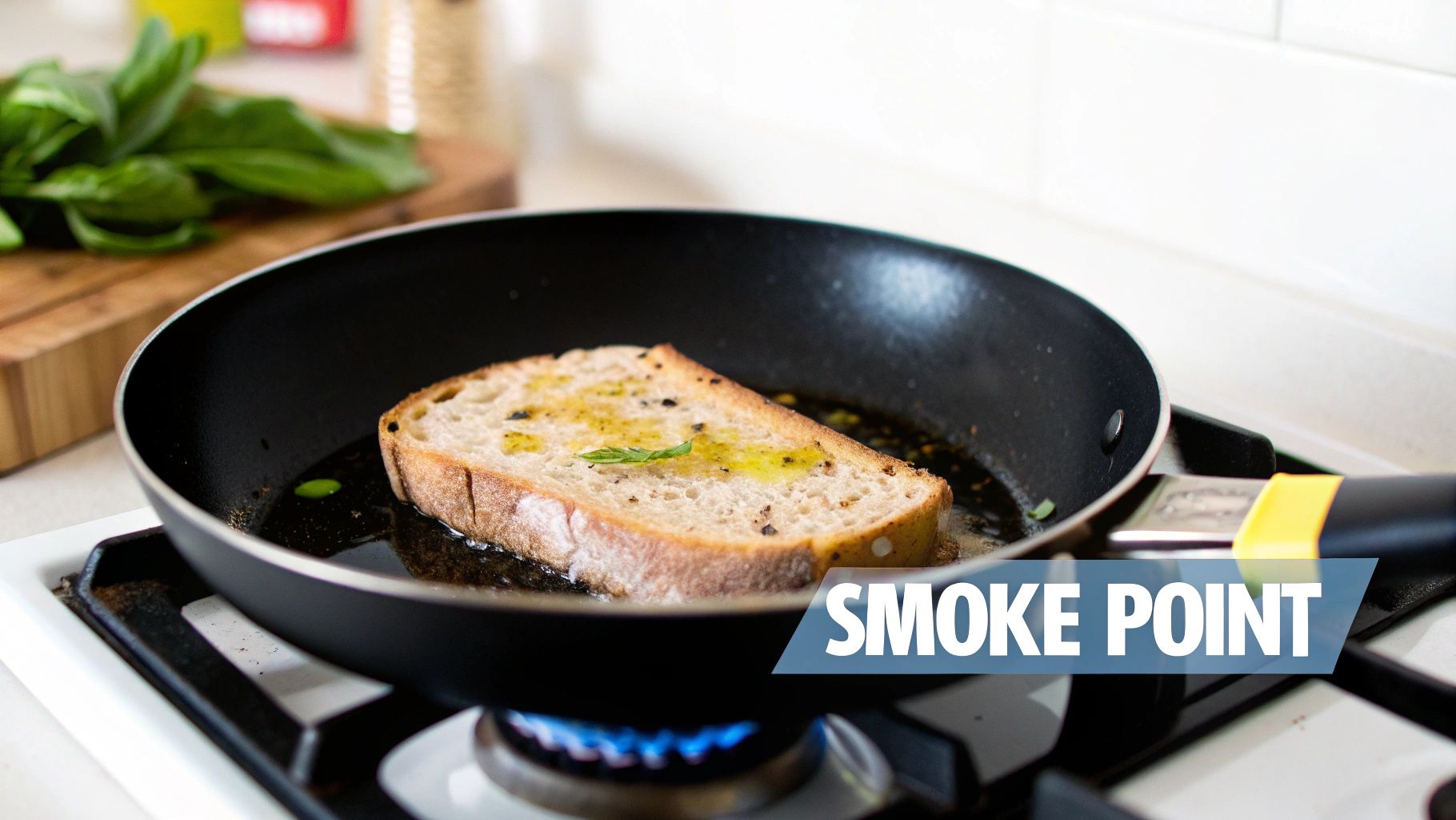 A slice of bread with olive oil and herbs cooking in a frying pan on a gas stove.