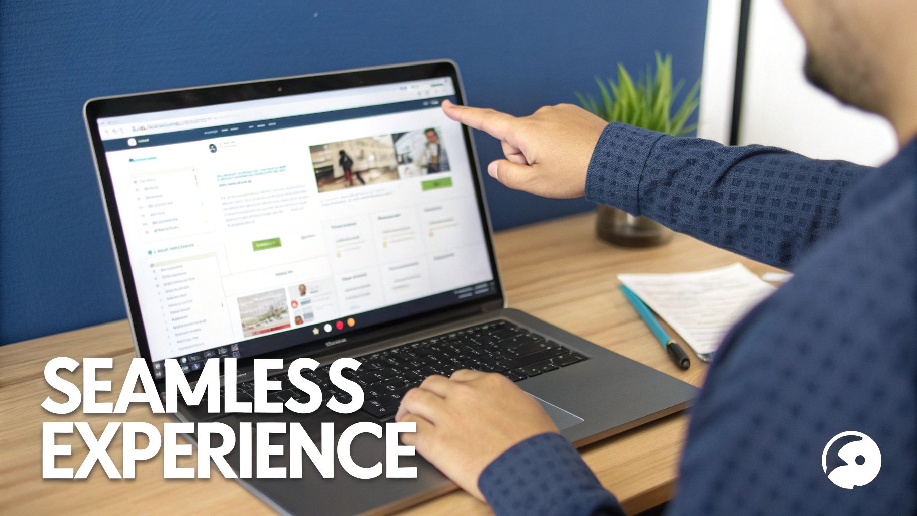 A person points at a laptop screen displaying a web interface, illustrating a seamless digital experience.