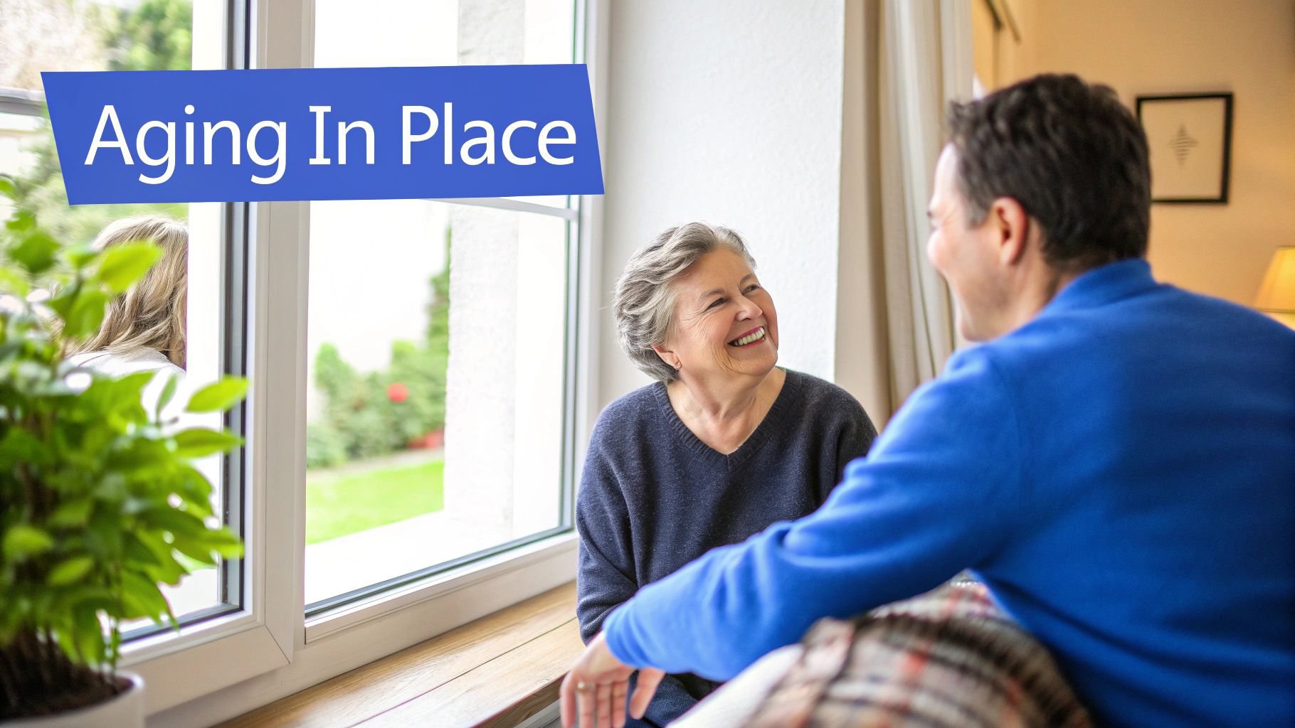 An older woman smiling and conversing with a man in a home setting, with an 'Aging In Place' banner.