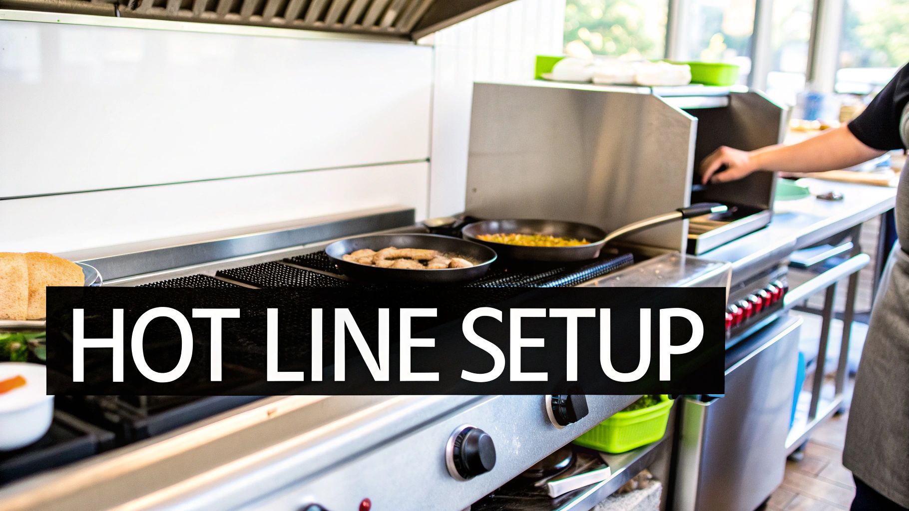 A chef works at a busy commercial kitchen hot line, cooking food in pans on a stovetop.