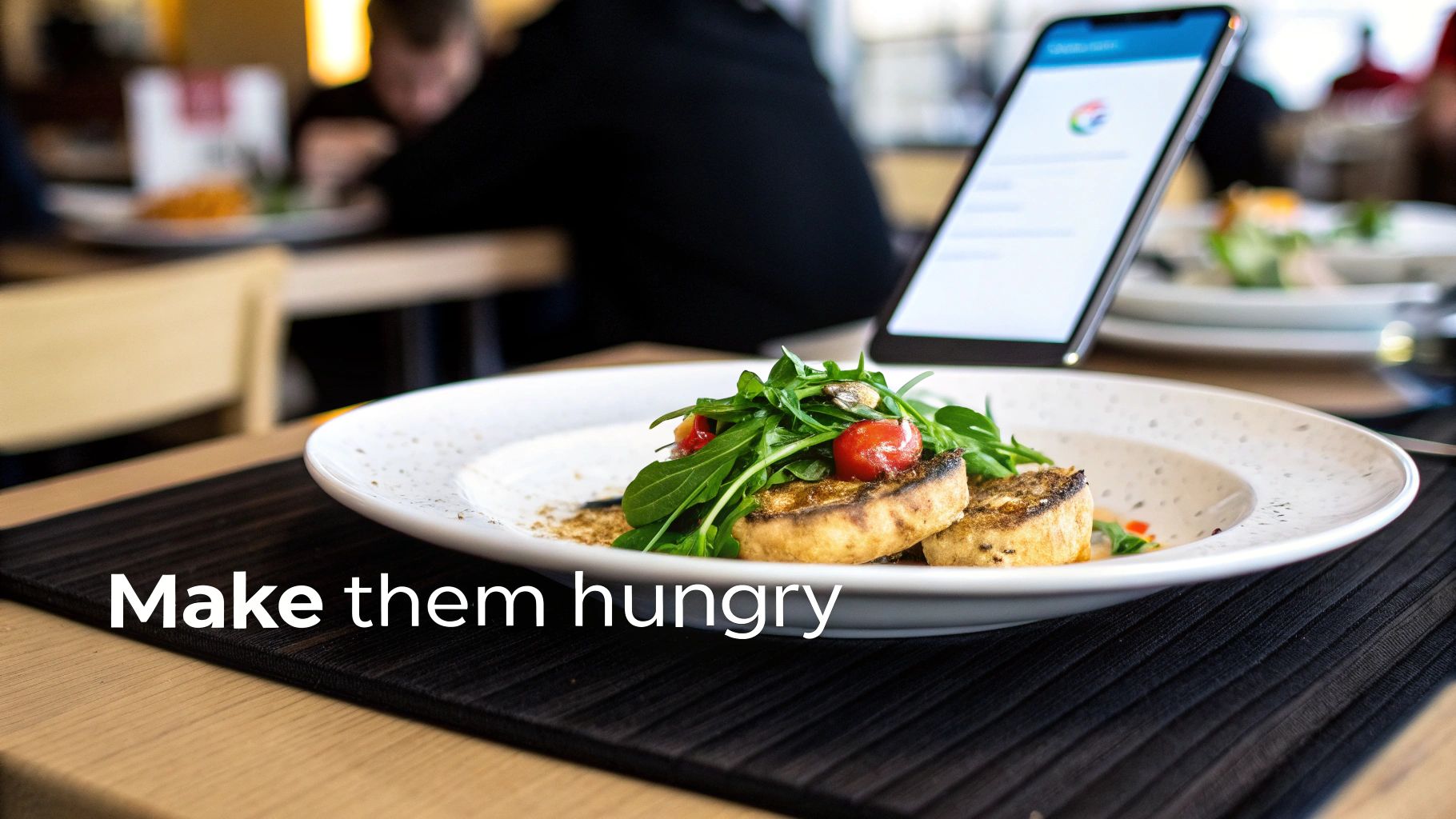 Delicious meal with grilled food, arugula, and cherry tomatoes on a plate in a restaurant, with a smartphone displaying a digital menu.