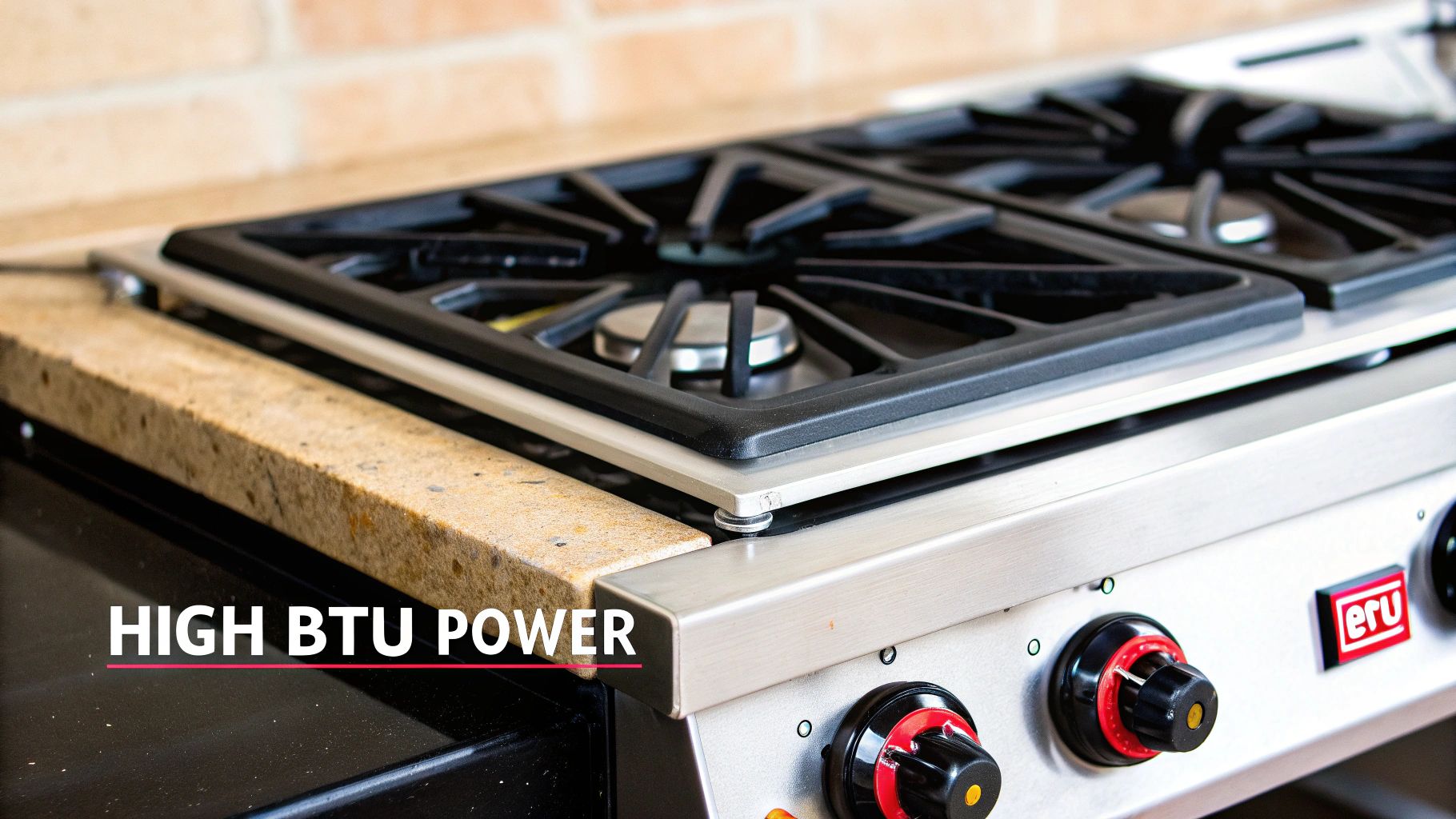 A close-up of a stainless steel 2-burner gas cooktop built into a granite countertop, featuring control knobs.