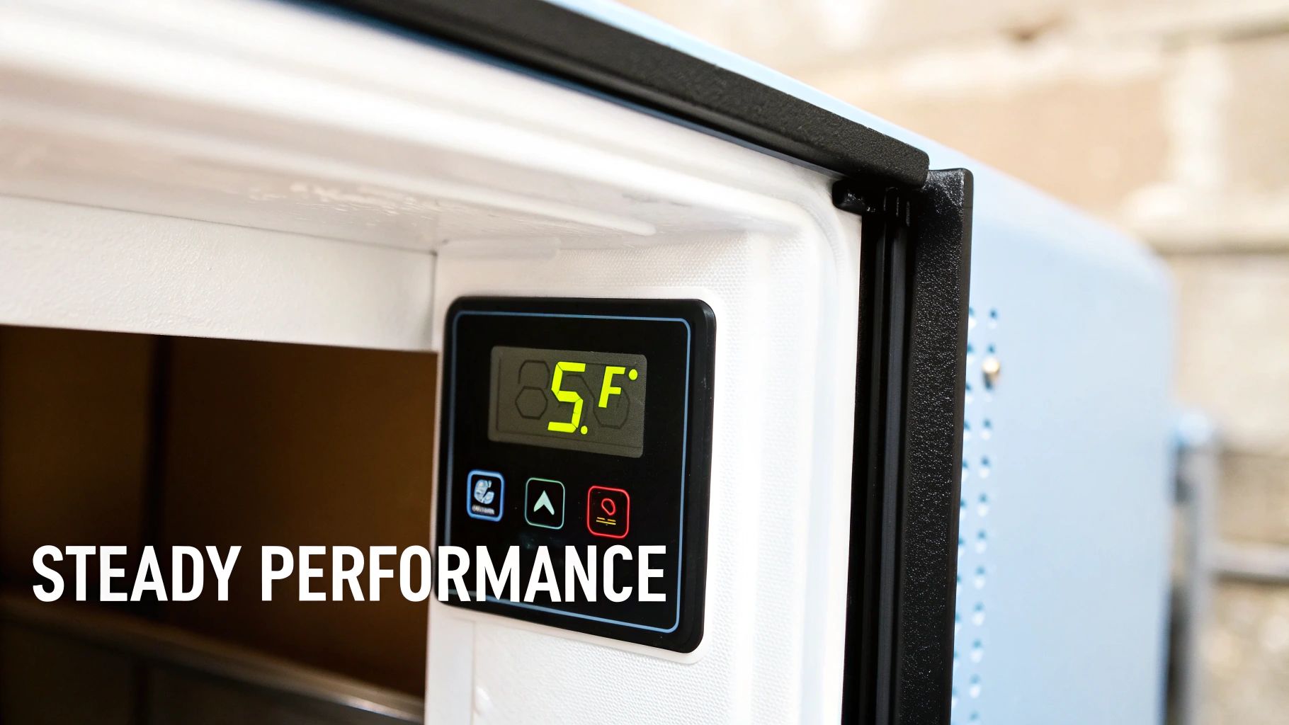 A freezer's open door reveals a digital temperature display showing 85°F, highlighting reliable operation.