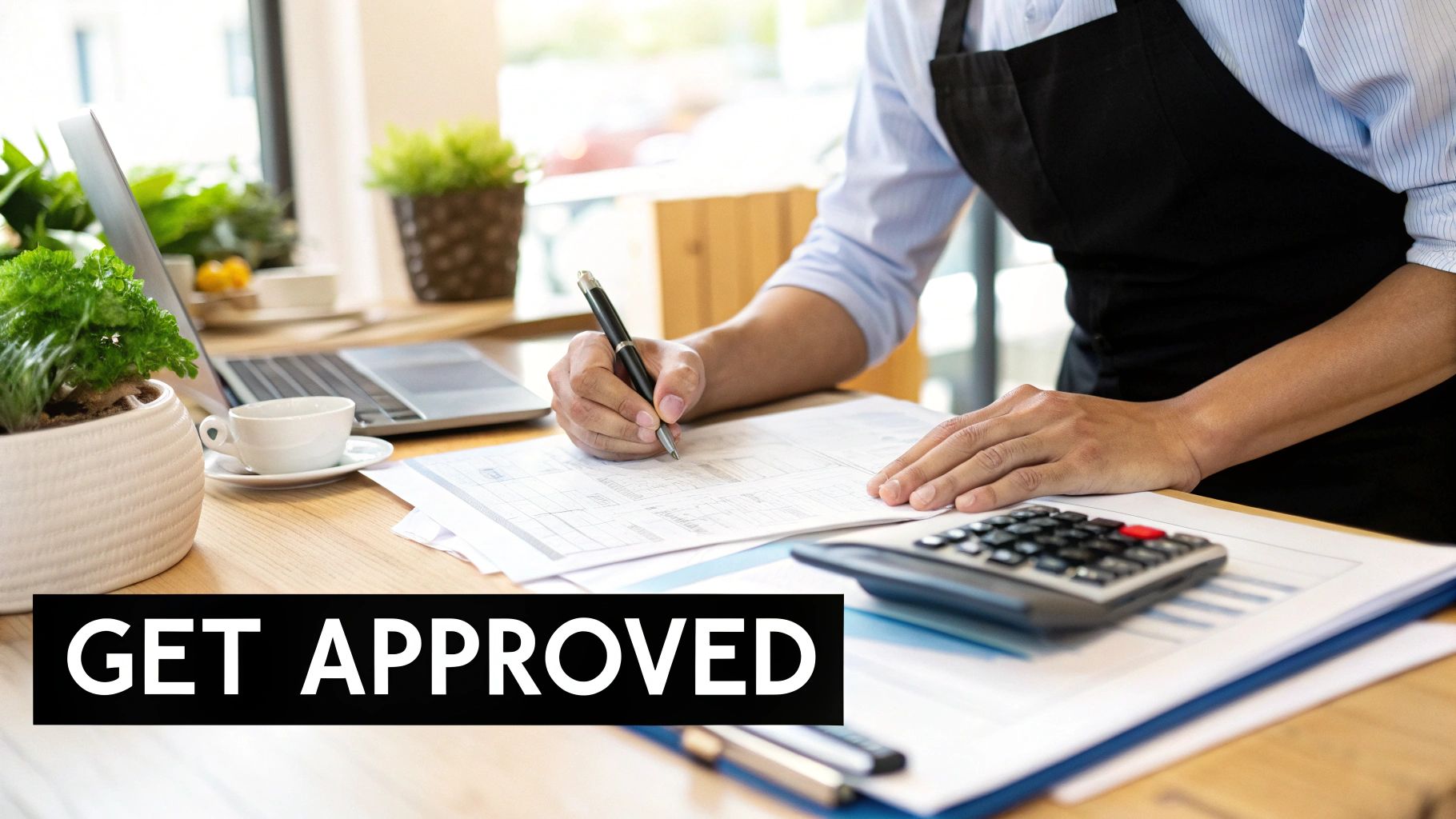 A restaurant owner reviewing financial documents for an equipment financing application