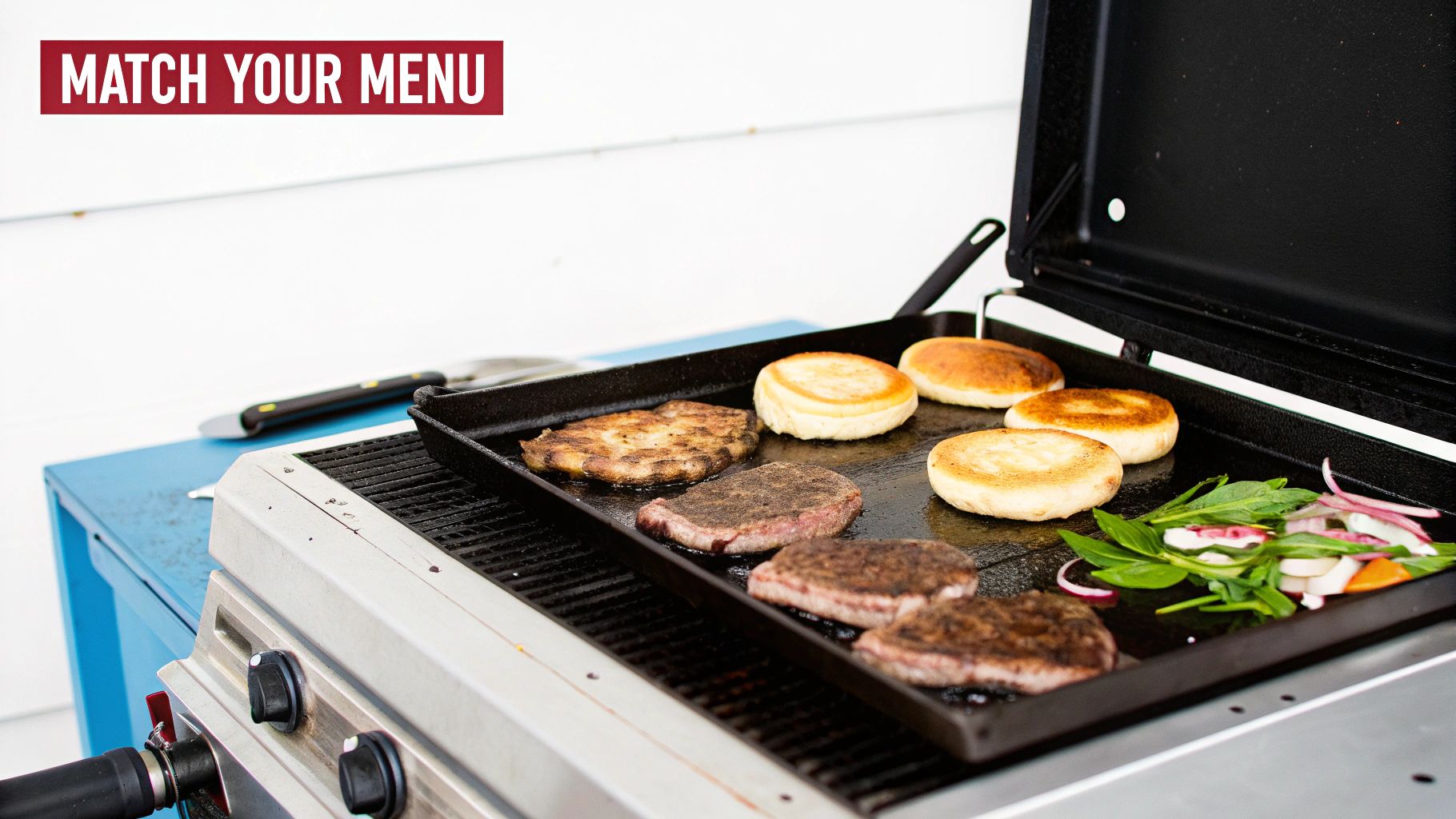 A chef expertly flipping burgers on a wide commercial griddle, showcasing different temperature zones in action.