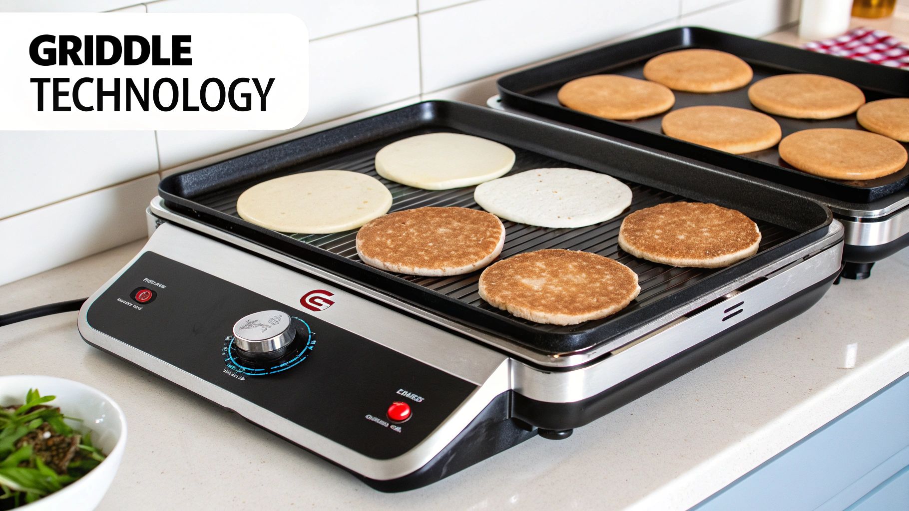 Close-up of a commercial electric griddle's thick steel plate and temperature control knobs.