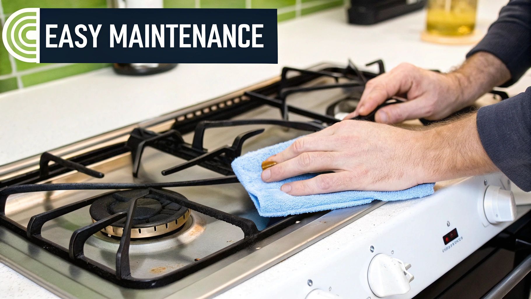 A person's hands cleaning a stainless steel 2-burner gas cooktop with a blue cloth, highlighting easy maintenance.