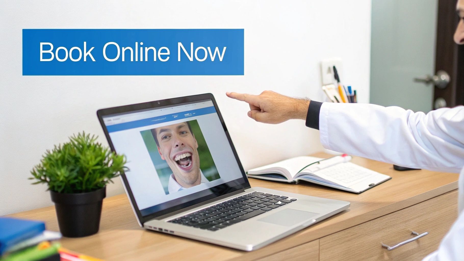 A laptop on a desk showing a modern and clean dental practice website.