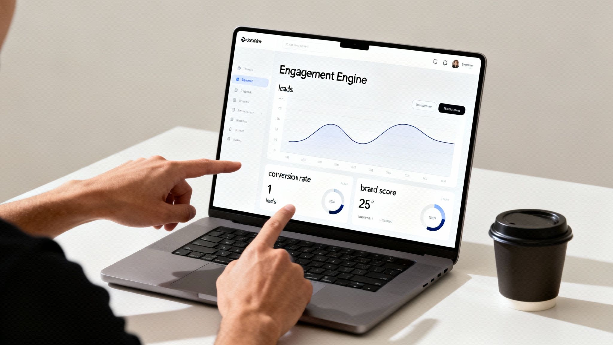 Hands interacting with a laptop screen displaying a business analytics dashboard, graphs, and data, next to a coffee cup.