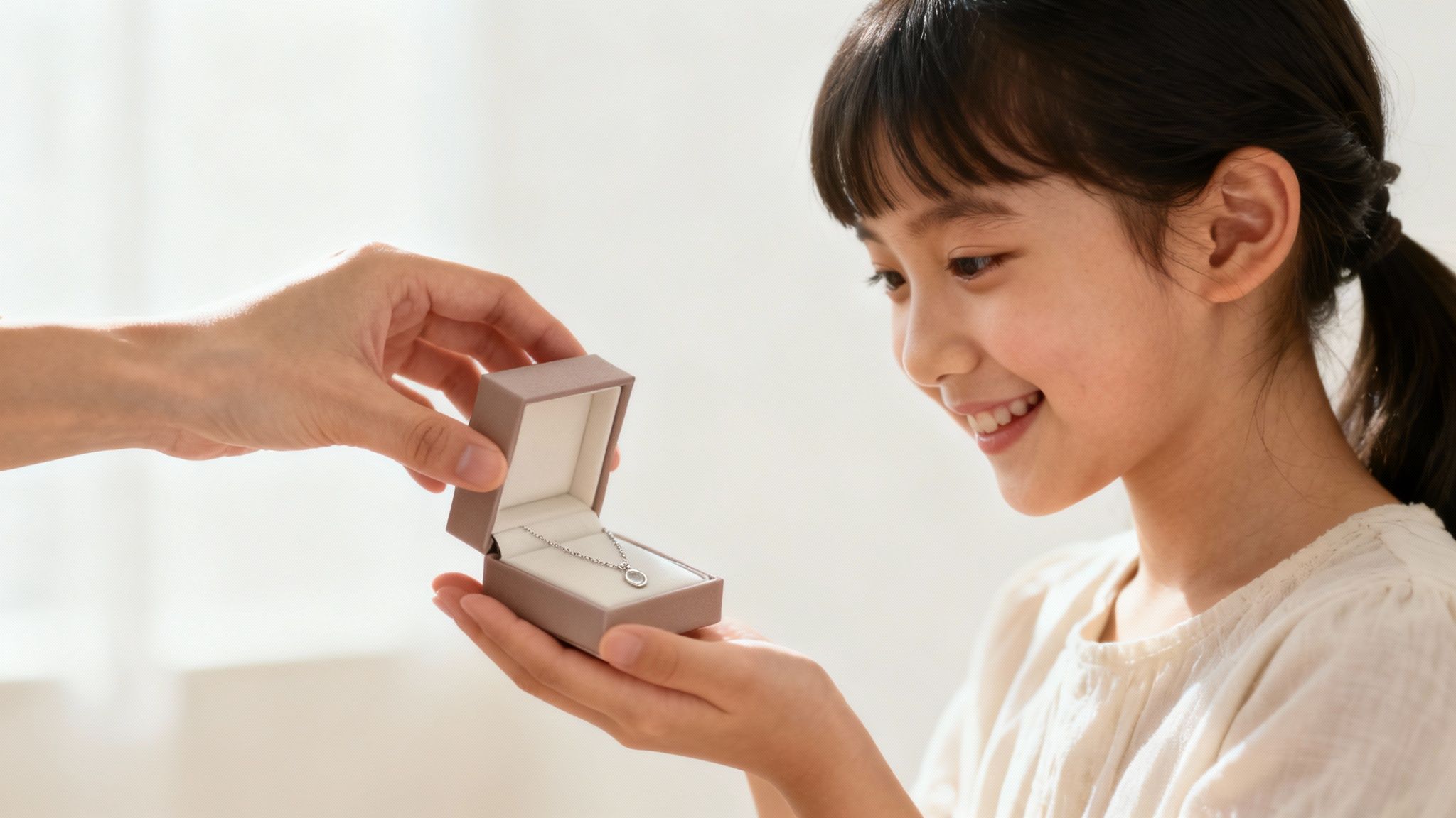 A mother and daughter smiling together, representing a strong bond