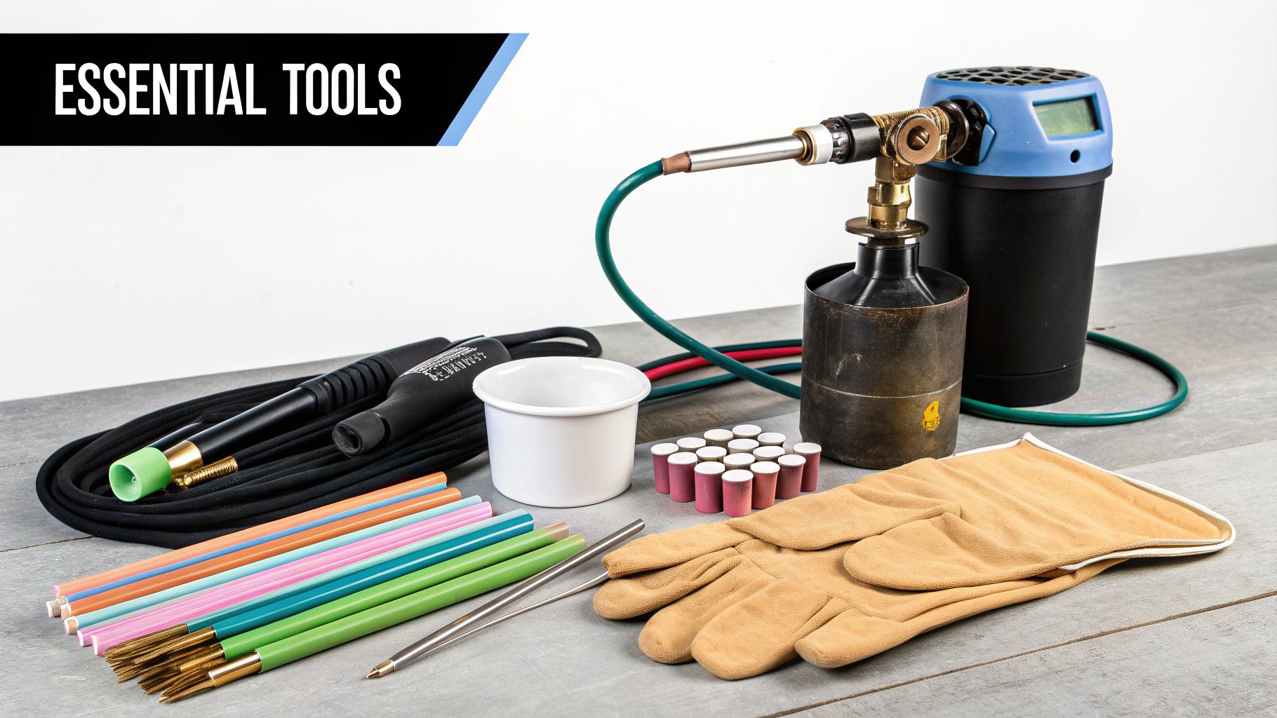 A collection of essential TIG welding tools, including a torch, gas tank, welding rods, gloves, and sharpening stones.