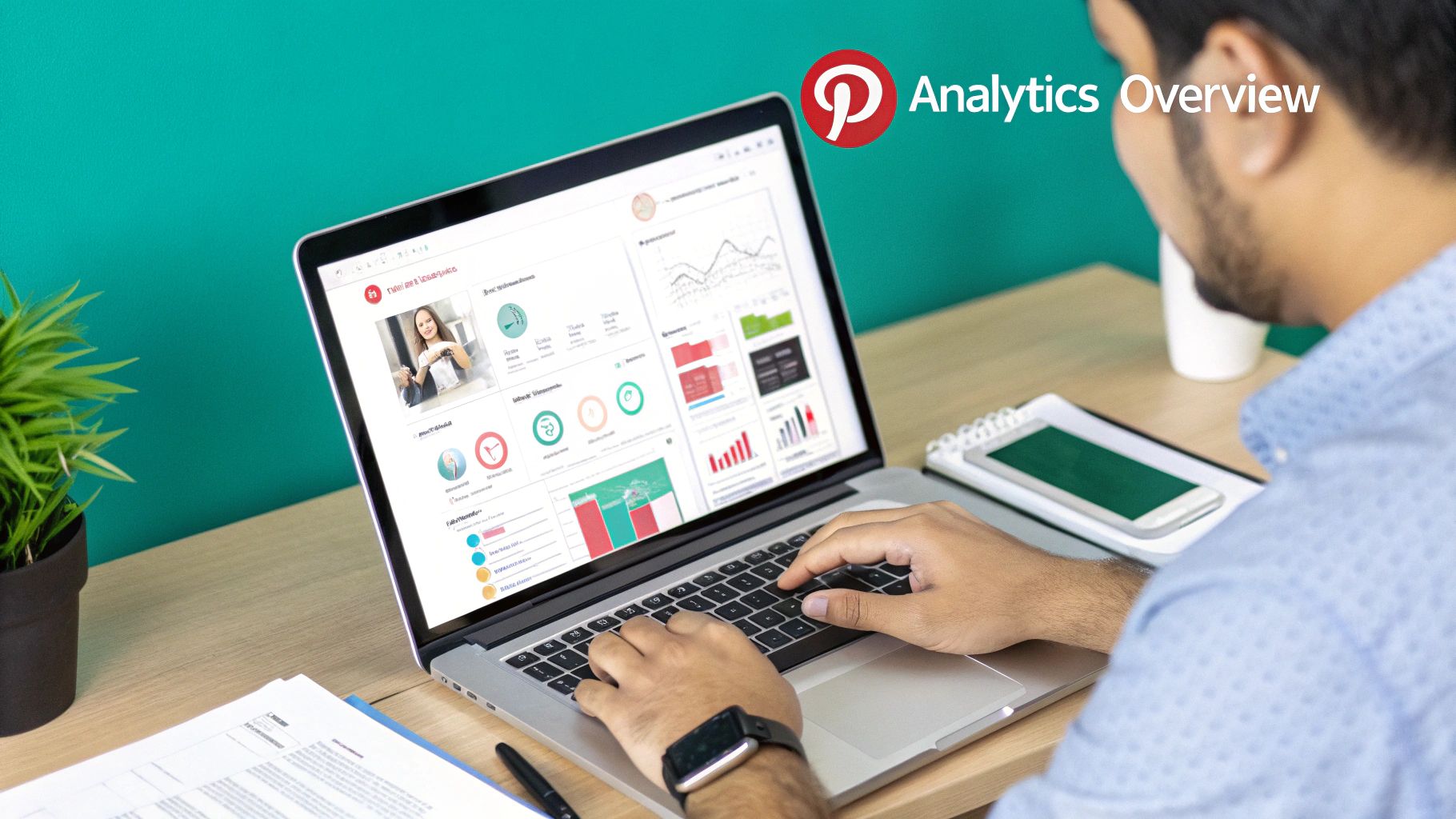 An individual analyzing Pinterest analytics on a laptop screen