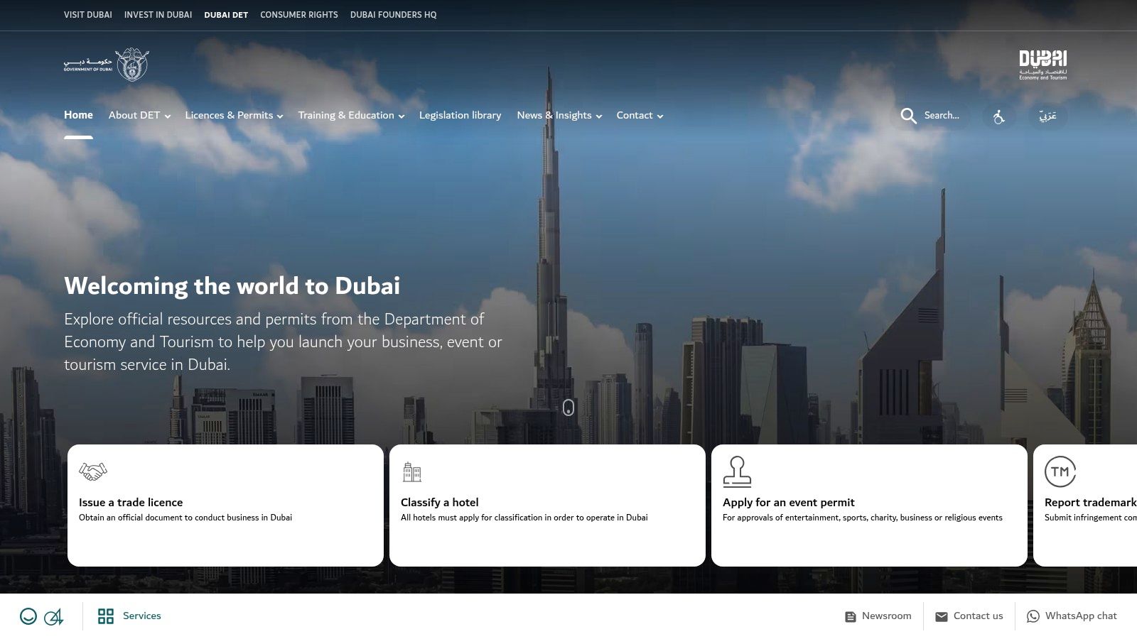 A screenshot of the Dubai Department of Economy & Tourism (DET) website's homepage, showing its clean design and links to key business services.