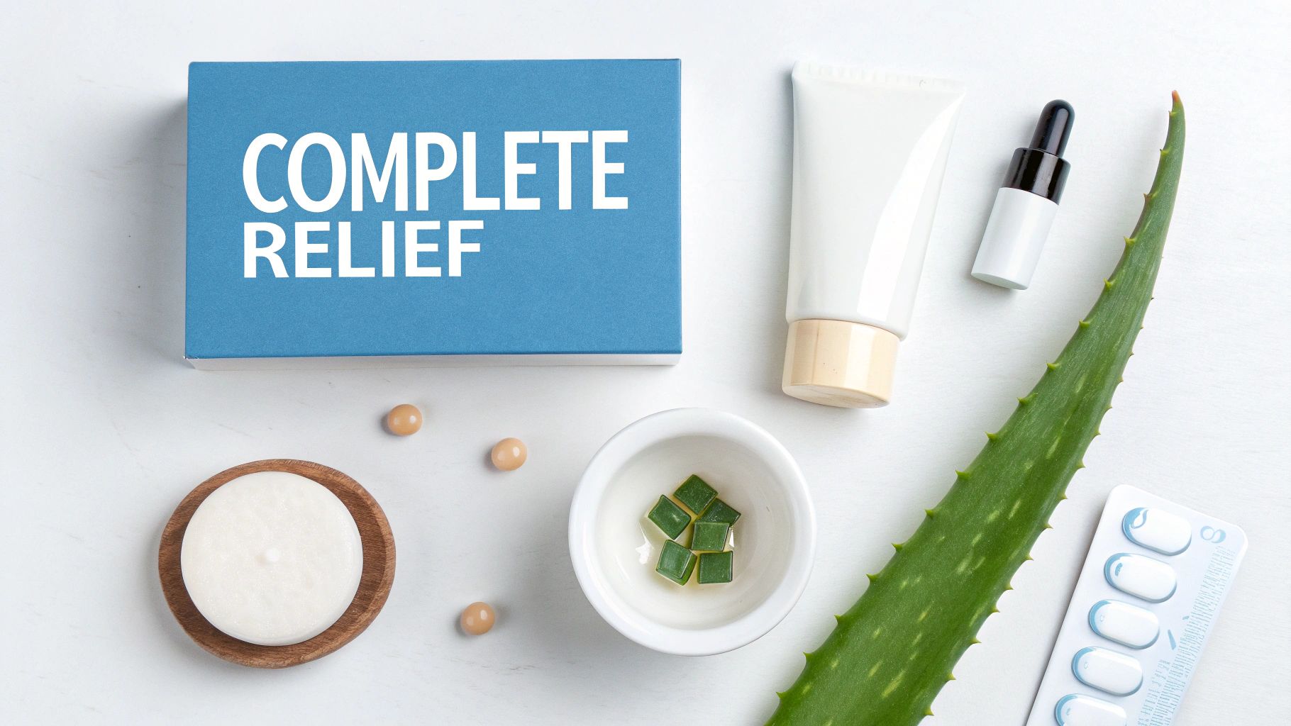 Flat lay of a blue box labeled 'COMPLETE RELIEF' surrounded by aloe vera, skincare, and supplements.