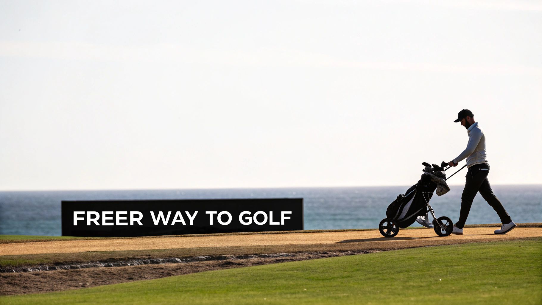 A golfer walks down a lush green fairway with a remote control golf bag gliding alongside him.