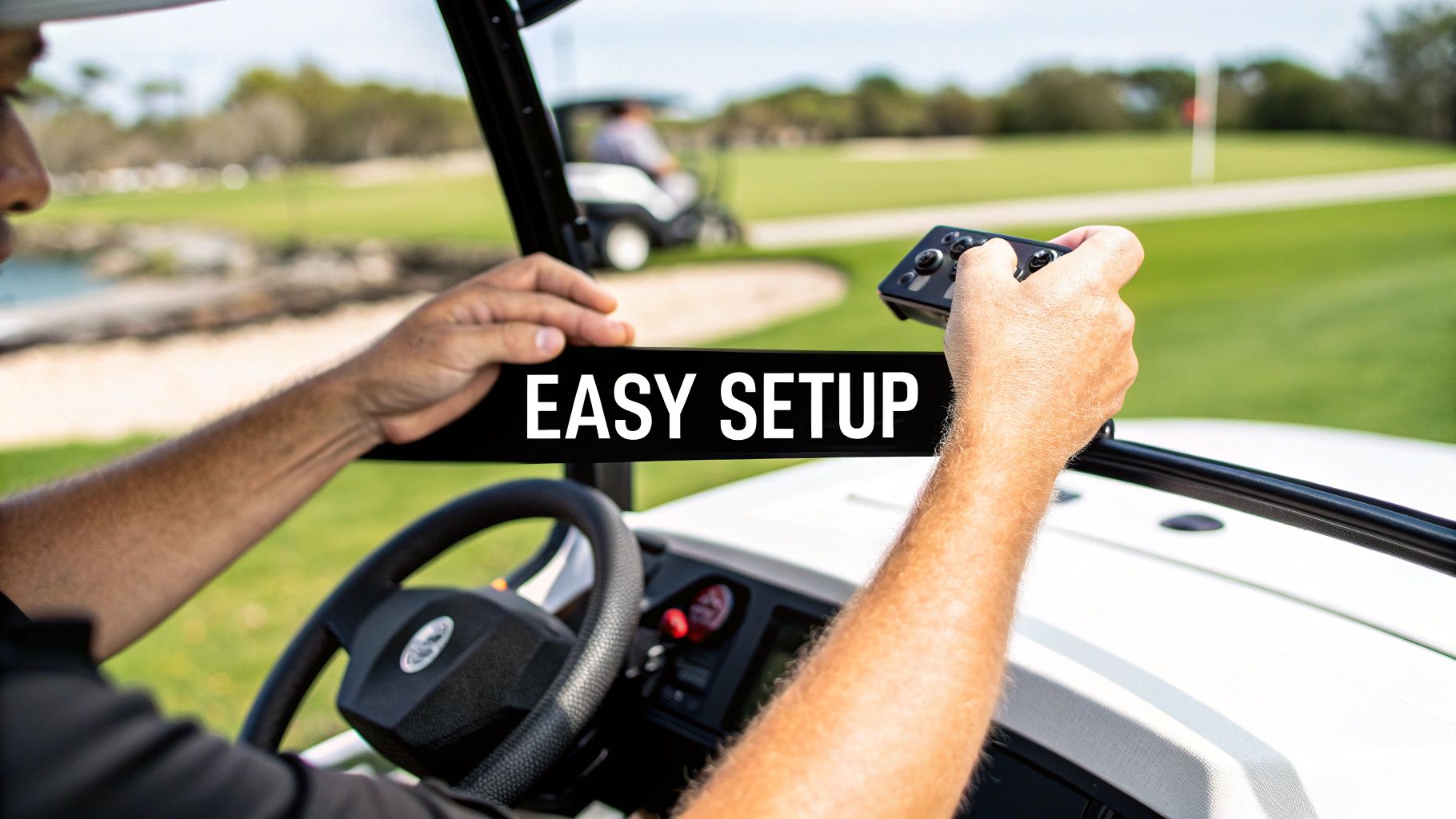 A golfer uses a remote to guide their electric cart down a lush fairway