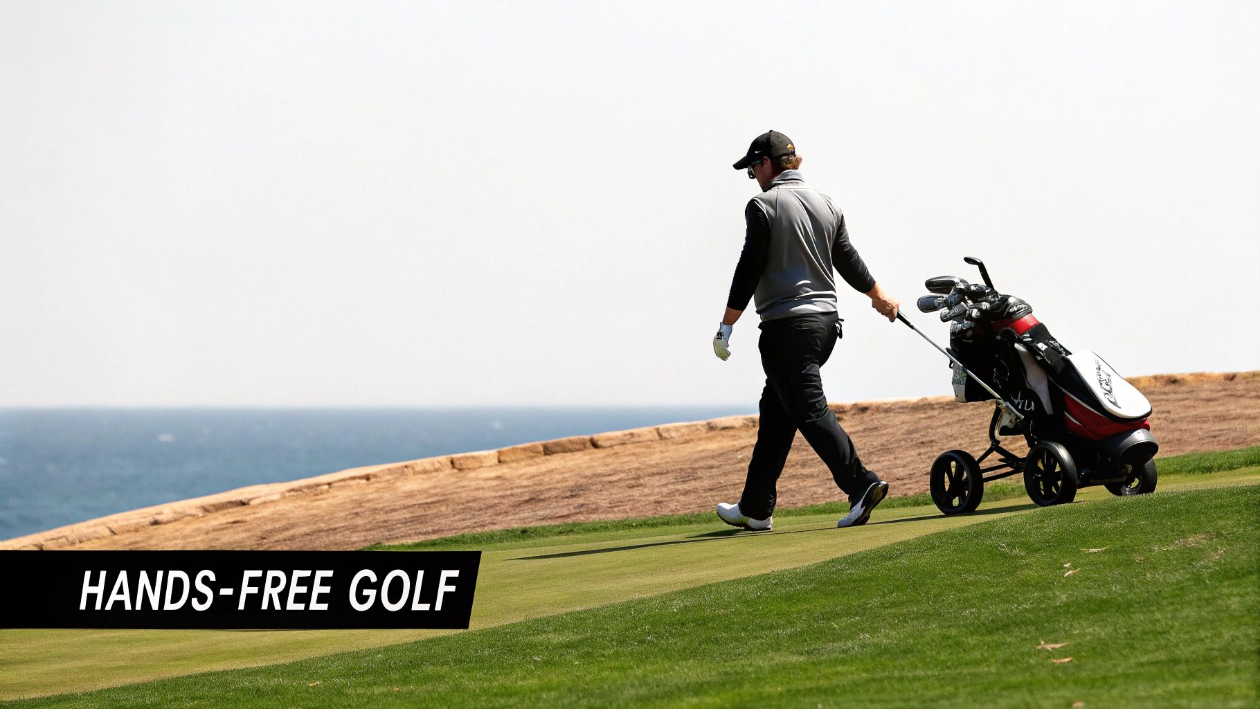 A golfer using a remote golf bag system on a sunny fairway, showing the caddie wheel attached to a standard golf bag.