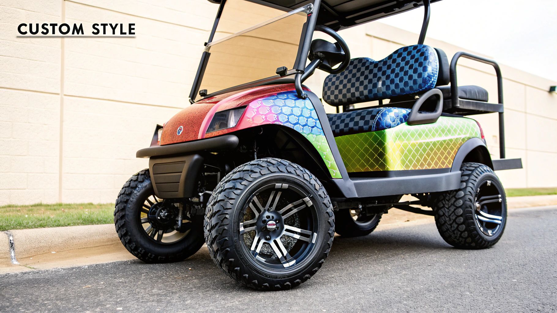 A custom golf cart with unique wheels and a stylish wrap