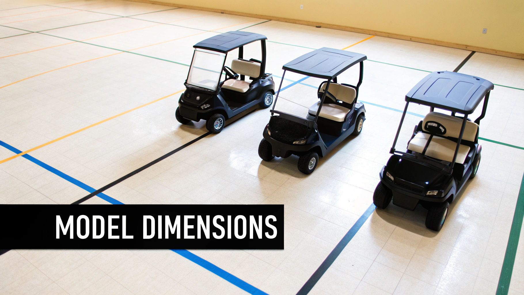 Three black golf carts with beige seats displayed indoors on a sports court floor.